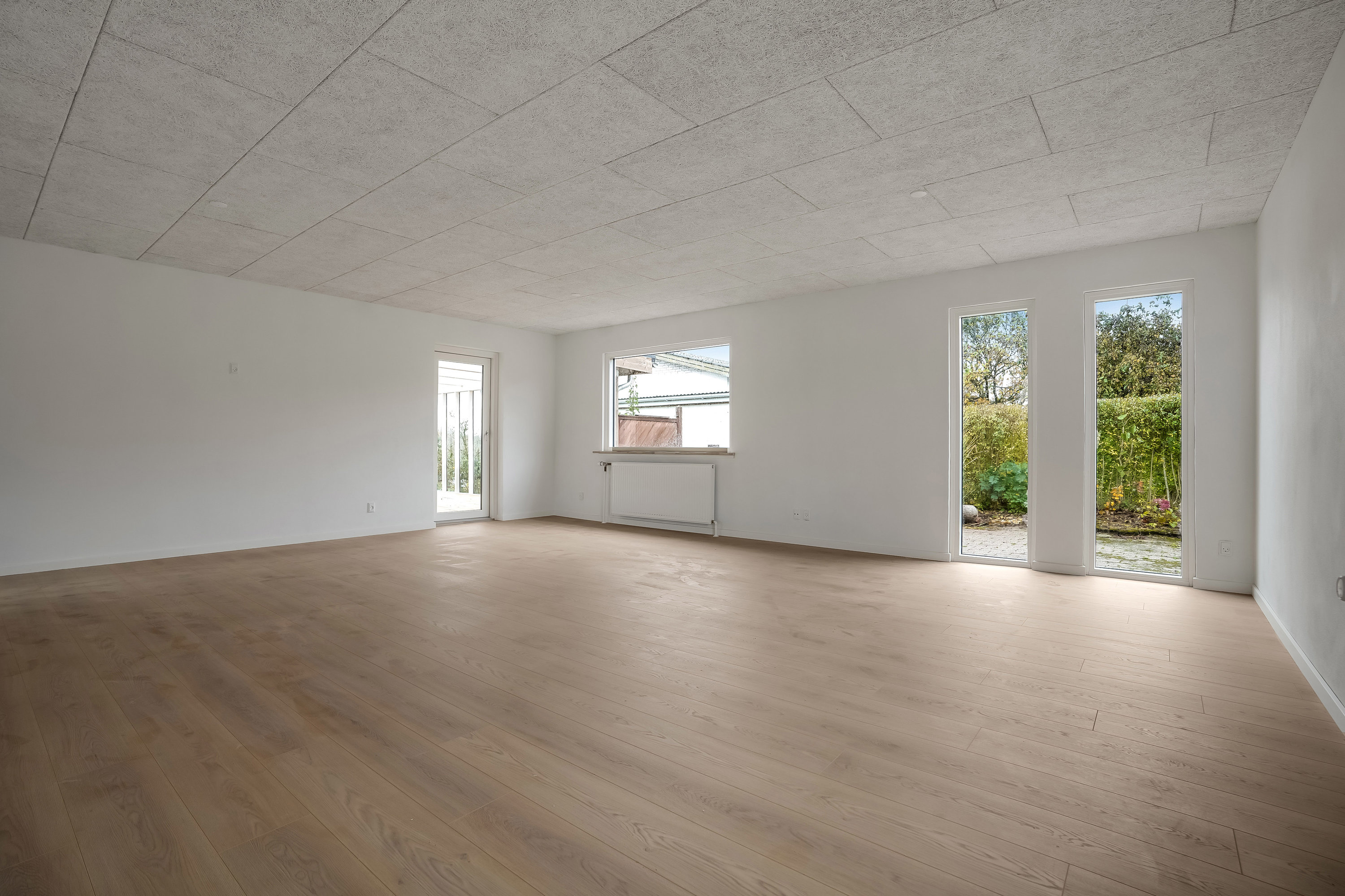 Fremhævet stue billede i fuldskærmstilstand. Billede af Gammelgårdsvej 3, 7321 Gadbjerg