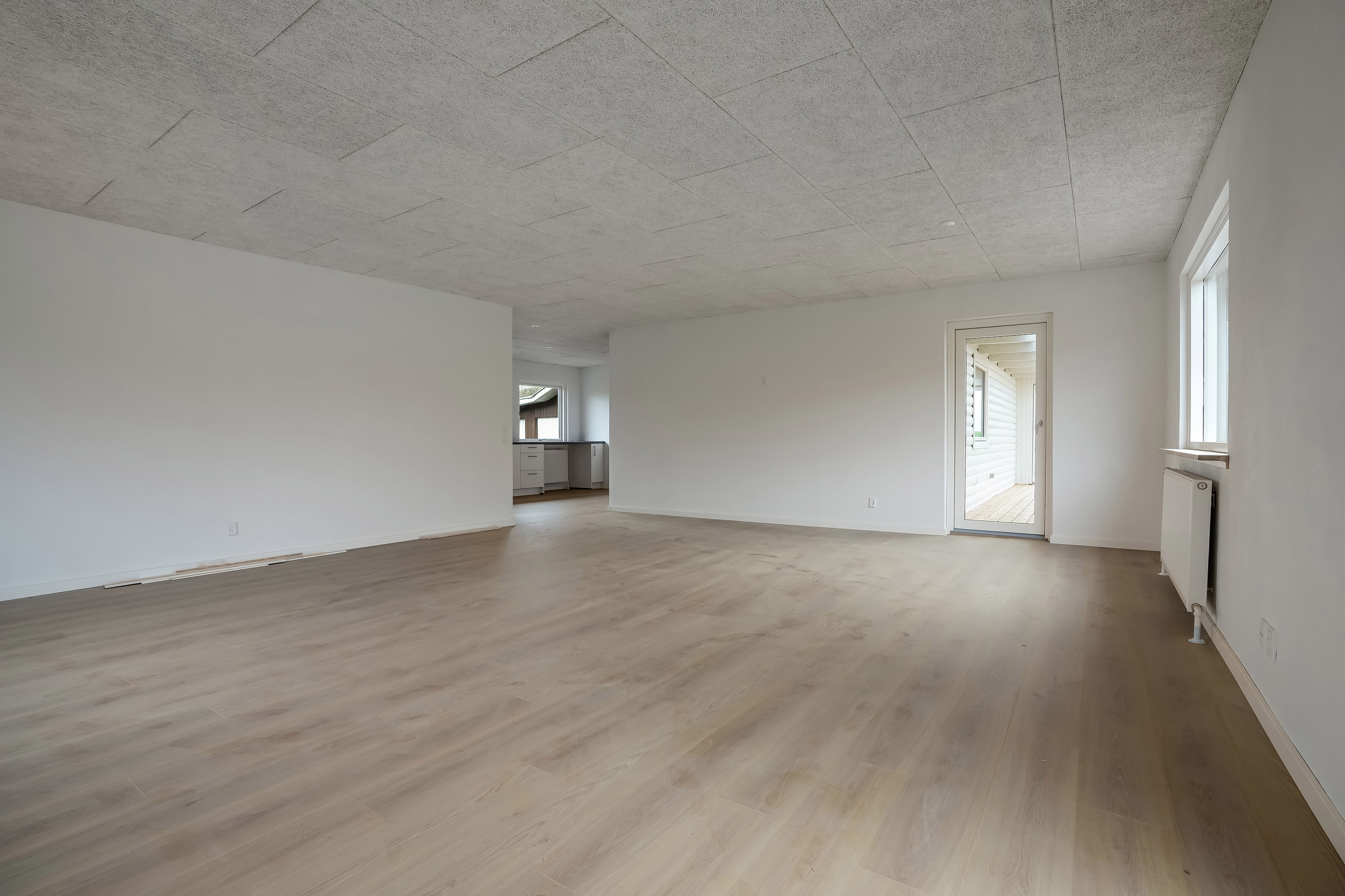 Fremhævet stue billede i fuldskærmstilstand. Billede af Gammelgårdsvej 3, 7321 Gadbjerg