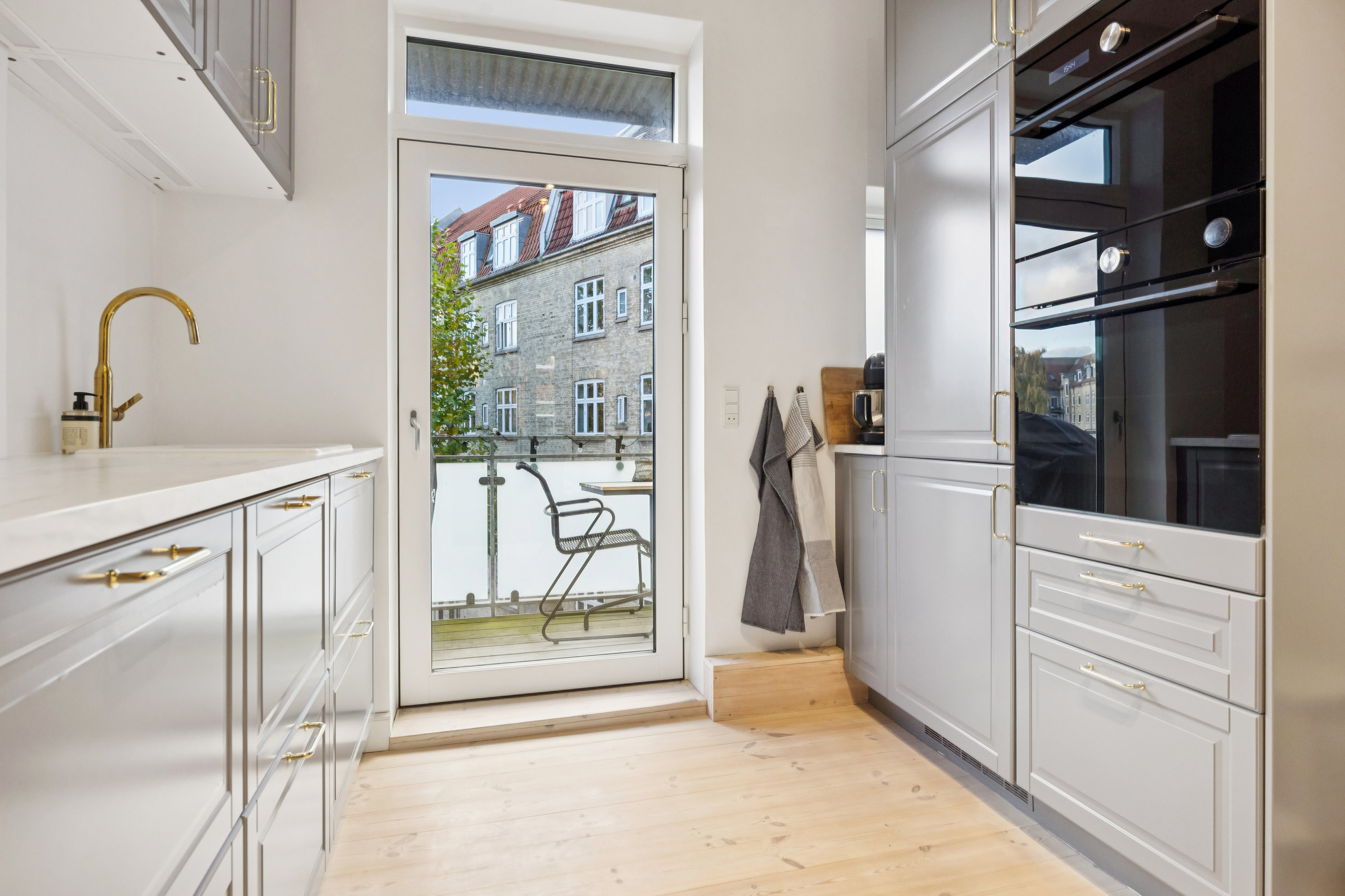 Fremhævet køkken billede i fuldskærmstilstand. Billede af Østerbro 80, 2. tv., 9000 Aalborg
