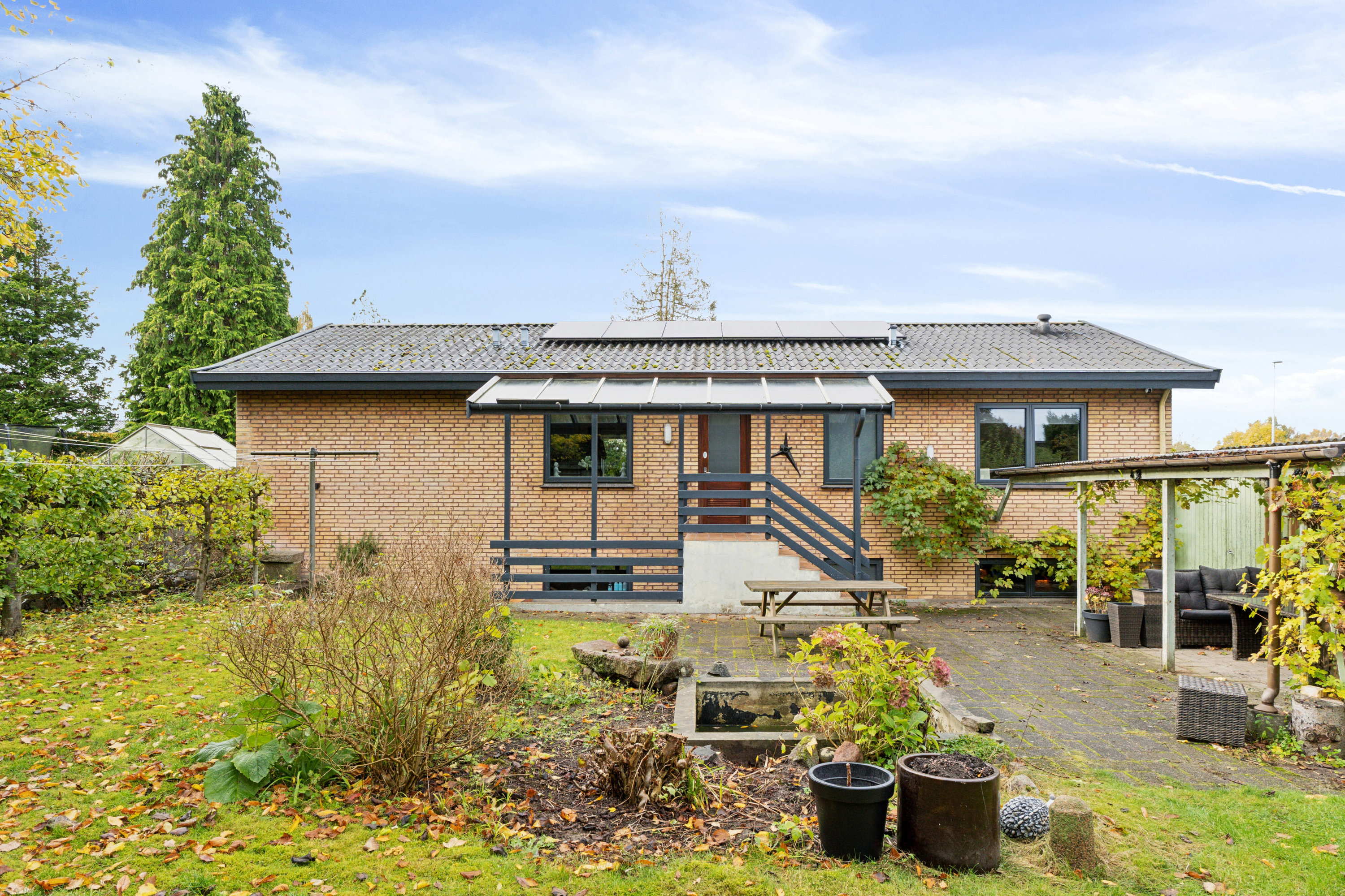 Fremhævet set fra haven billede i fuldskærmstilstand. Billede af Korup Tværvej 1A, Korup, 5210 Odense NV