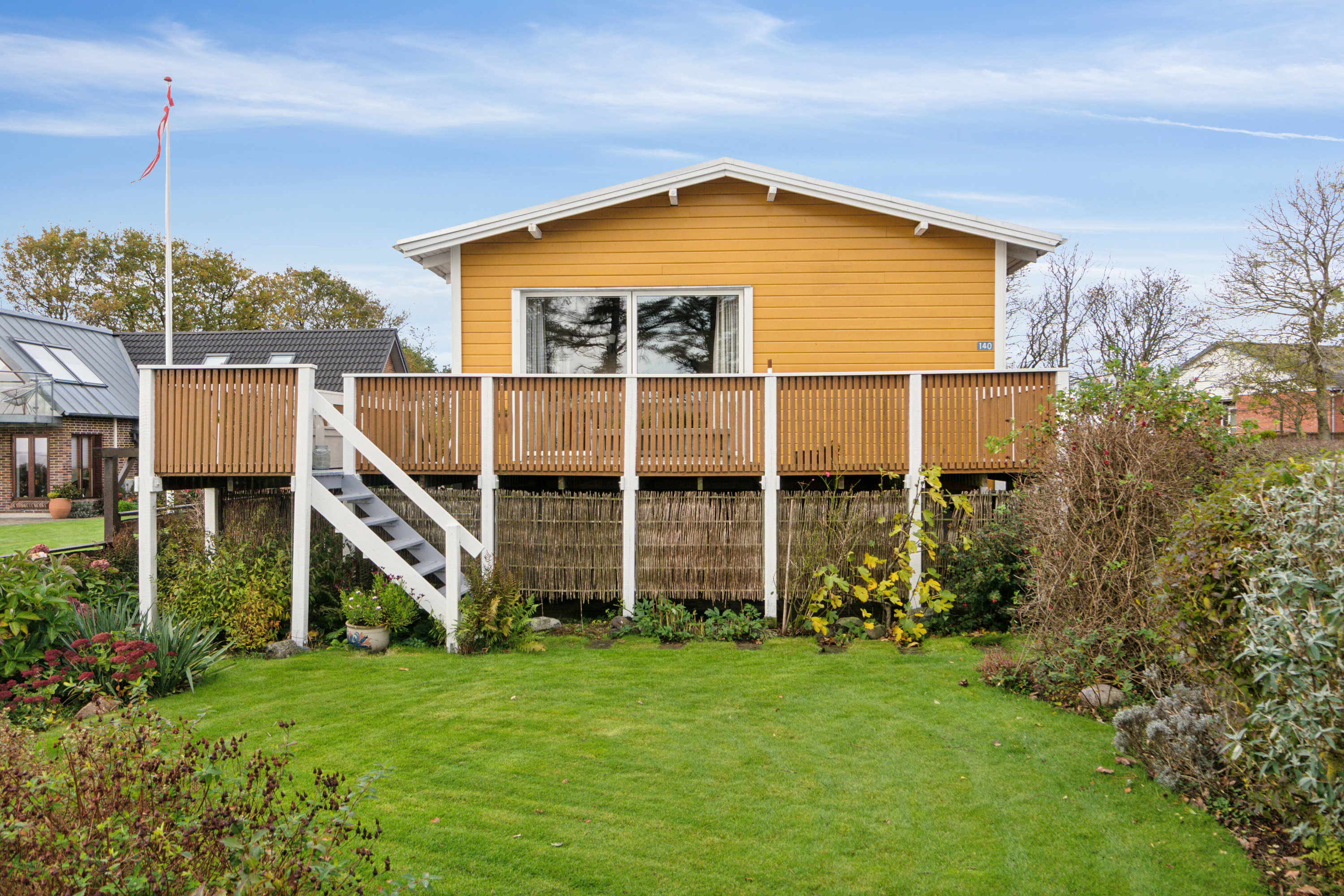 Fremhævet set fra haven billede i fuldskærmstilstand. Billede af Gl. Feggesundvej 140, Amtoft, 7742 Vesløs