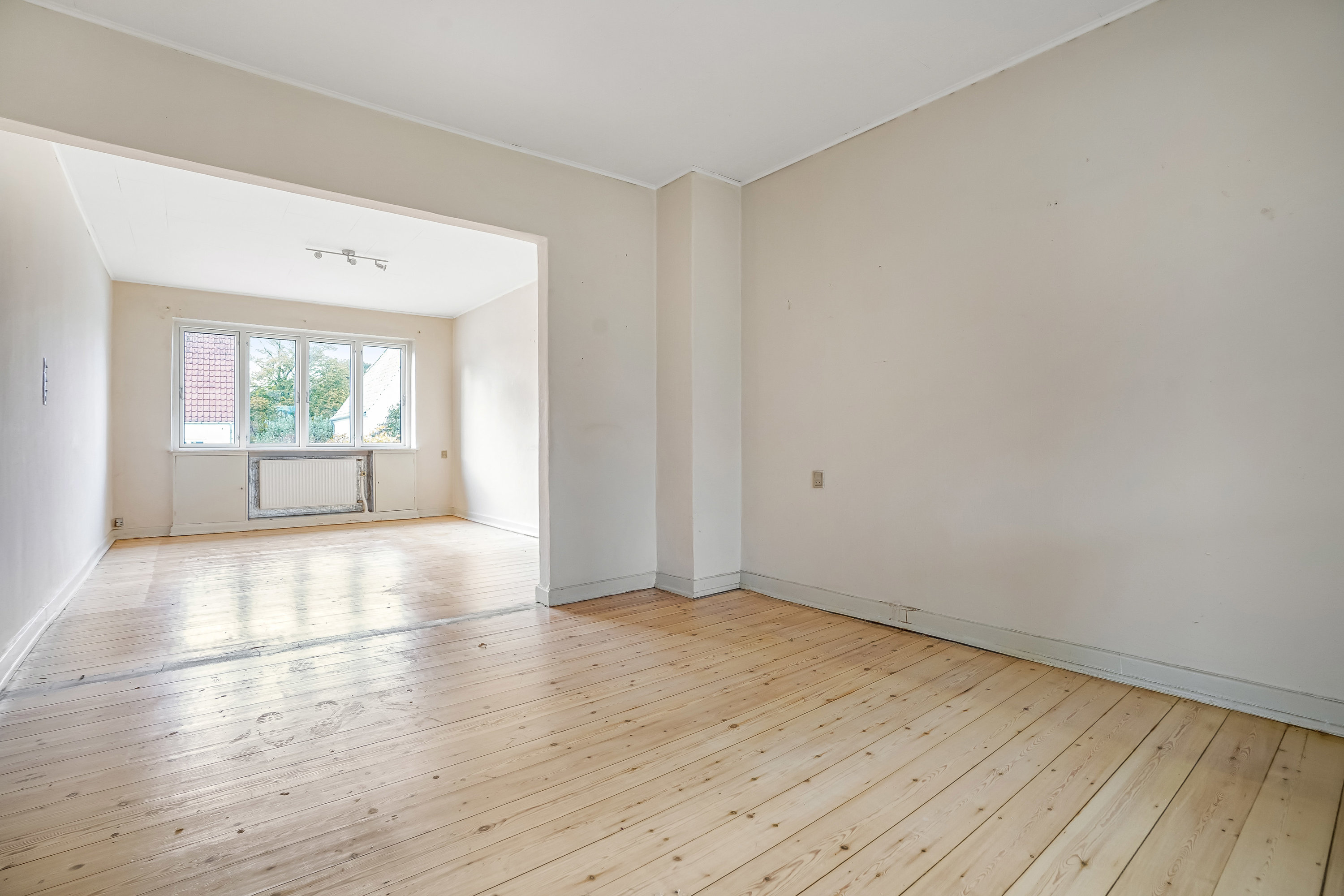 Fremhævet stue billede i fuldskærmstilstand. Billede af Holmehusvej 41, 5000 Odense C