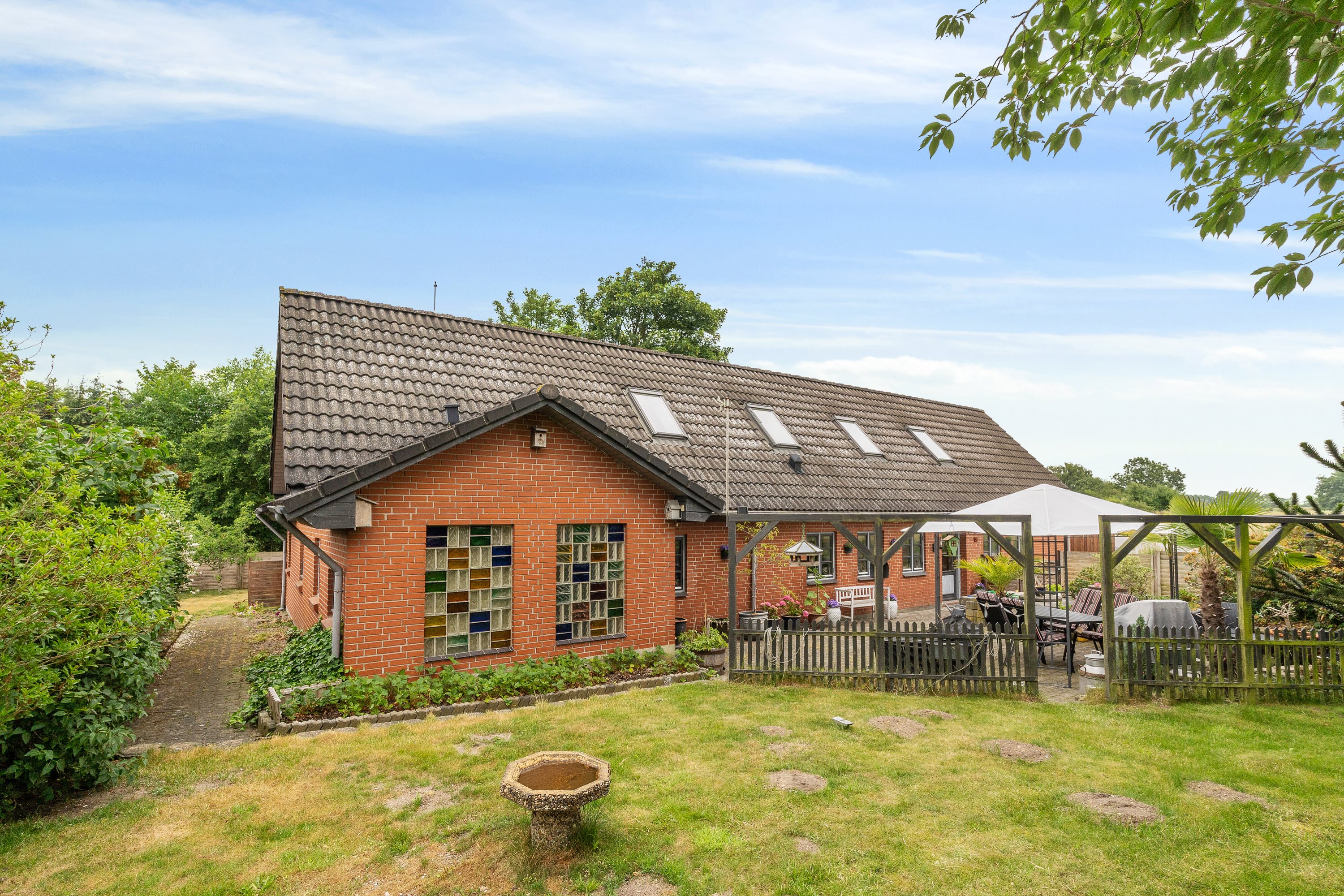 Fremhævet set fra haven billede i fuldskærmstilstand. Billede af Stougårdsvej 19, Vidstrup, 8860 Ulstrup