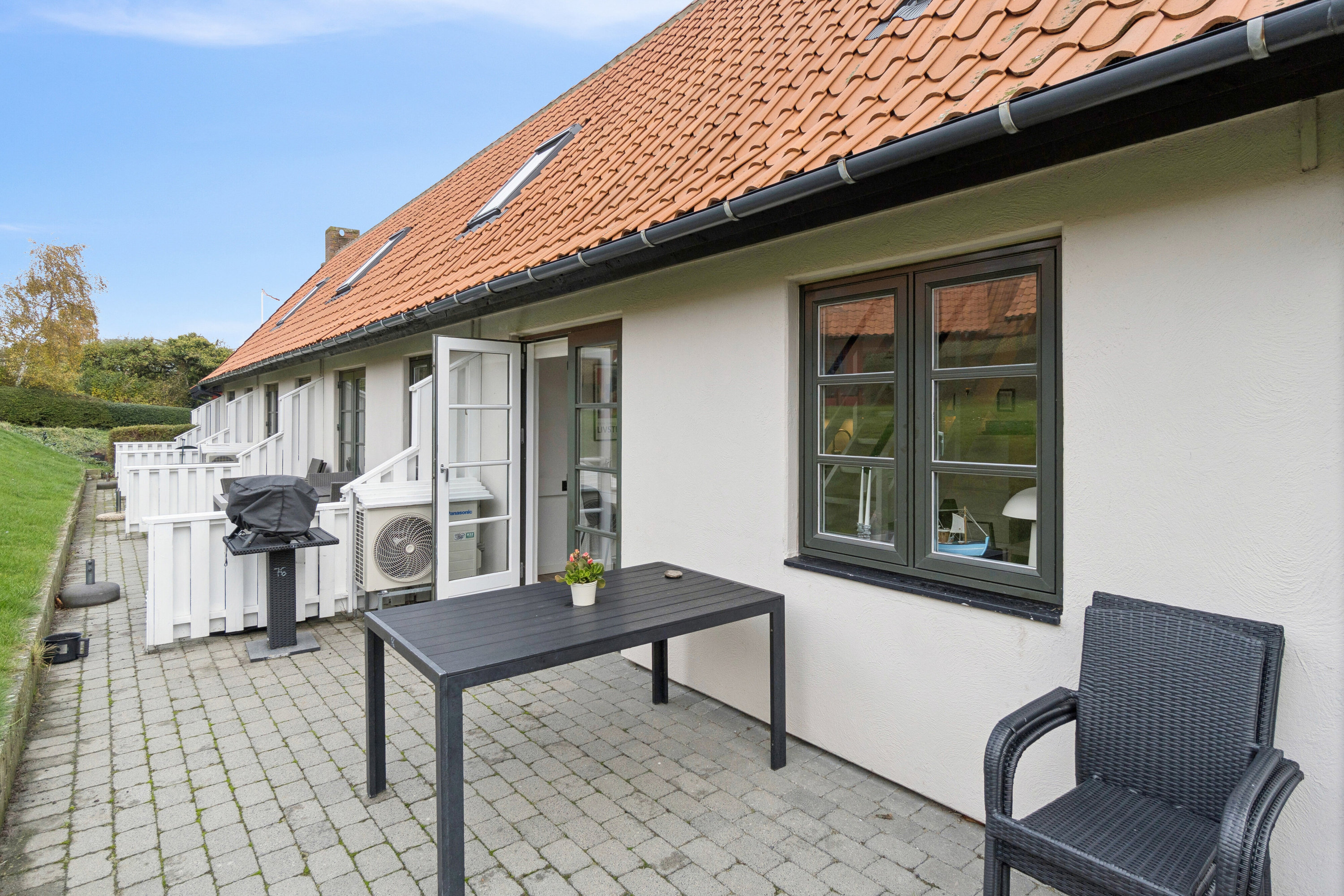 Fremhævet terrasse billede i fuldskærmstilstand. Billede af Gudhjem Feriepark 76, 3760 Gudhjem