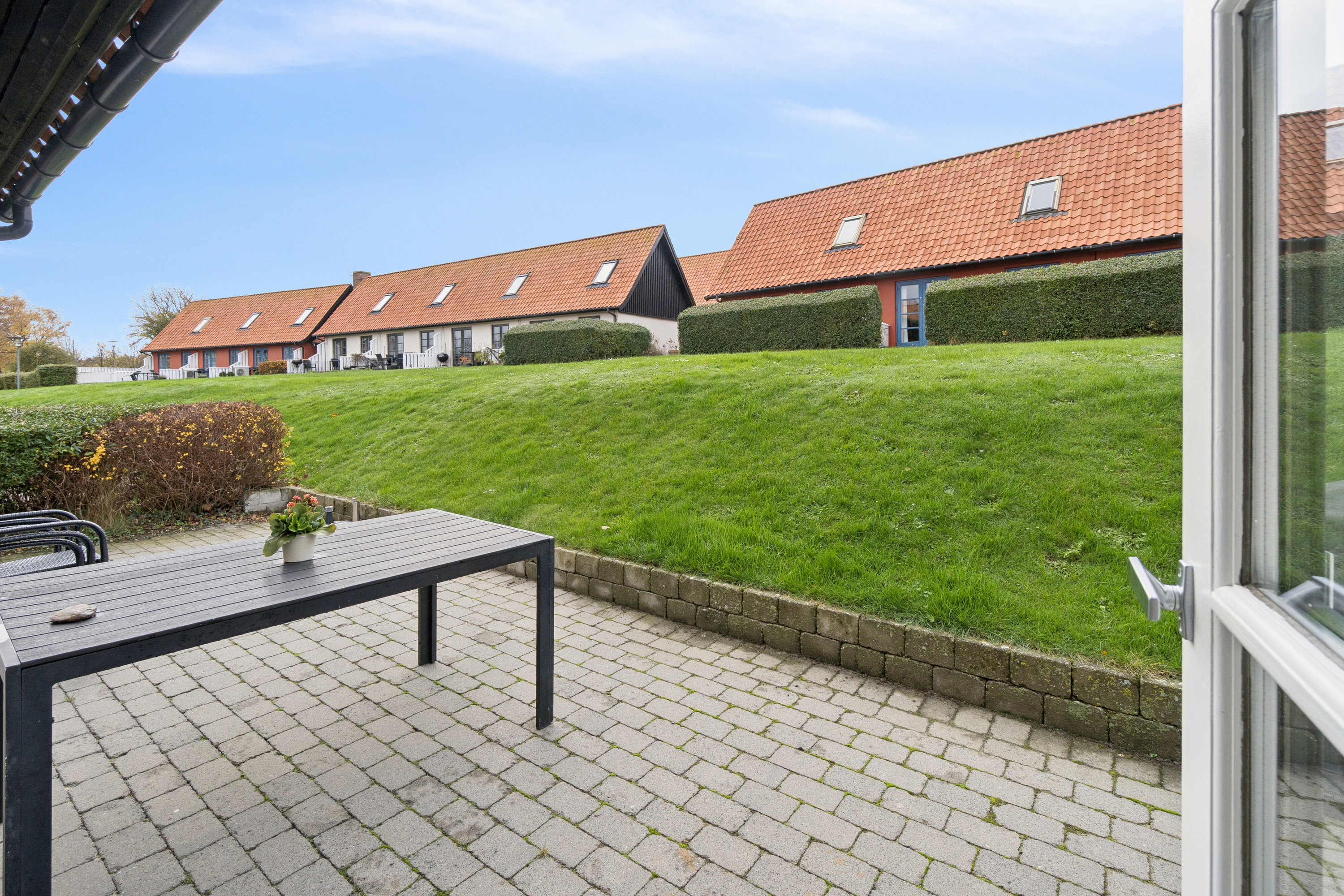 Fremhævet udendørs billede i fuldskærmstilstand. Billede af Gudhjem Feriepark 76, 3760 Gudhjem