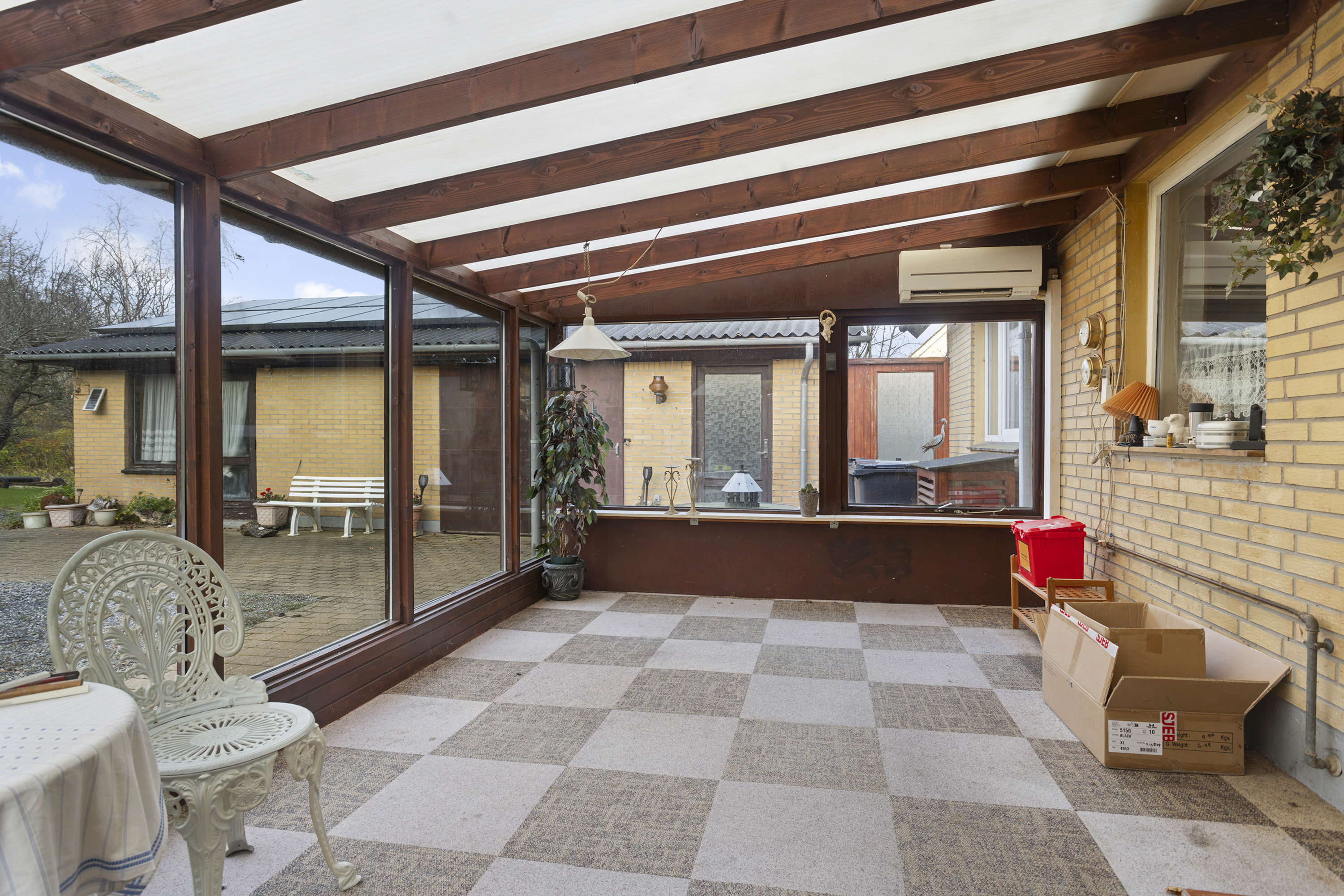 Fremhævet udestue billede i fuldskærmstilstand. Billede af Åhavevej 26, Voerså, 9300 Sæby