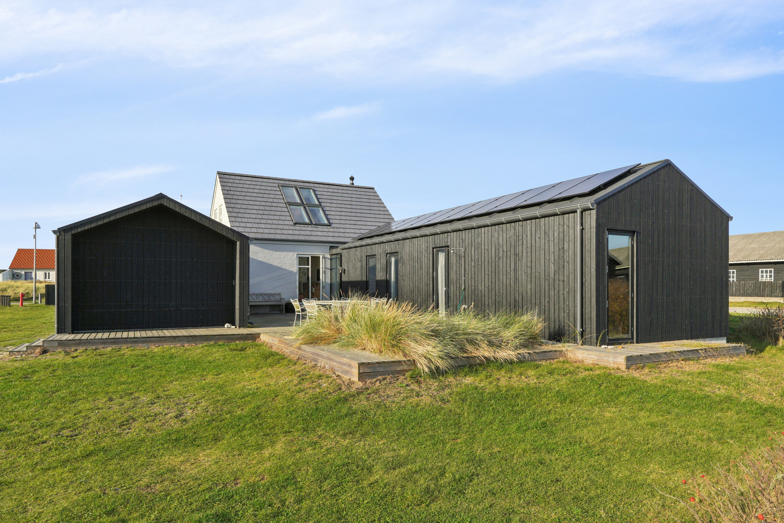 Fremhævet set fra haven billede i fuldskærmstilstand. Billede af Aalumvej 30, Agger, 7770 Vestervig