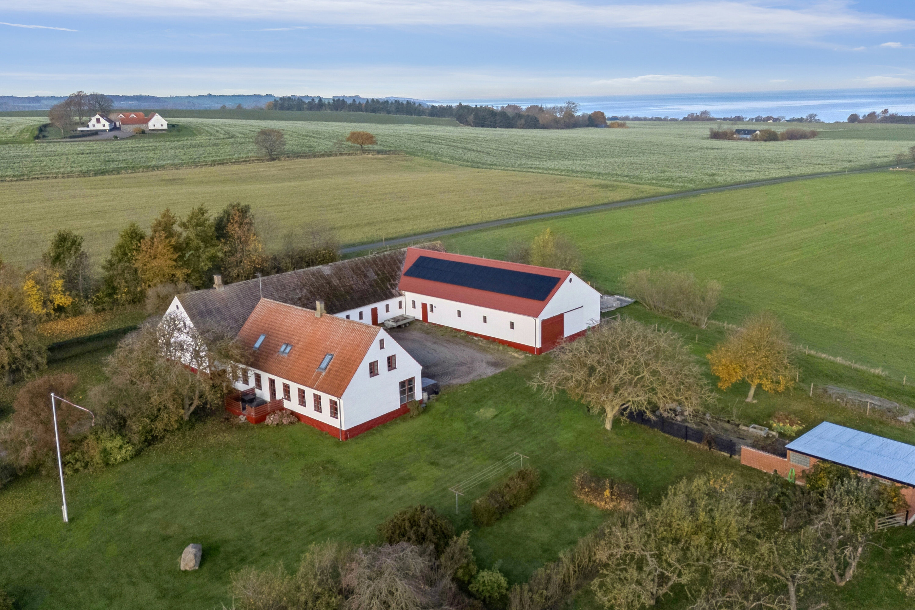 Fremhævet luftfoto billede i fuldskærmstilstand. Billede af Østermarievej 14, Ibsker, 3740 Svaneke