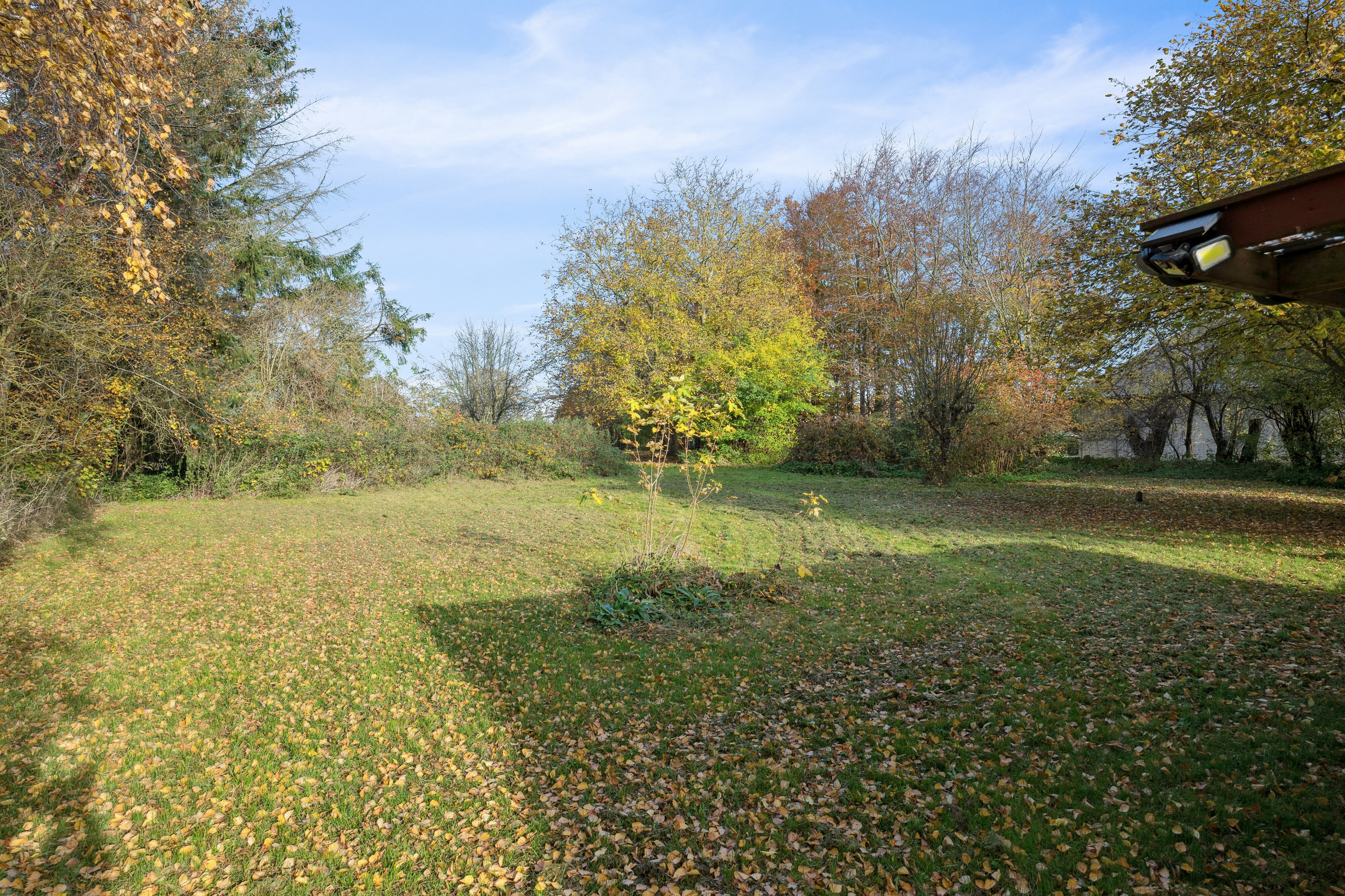 Fremhævet set fra haven billede i fuldskærmstilstand. Billede af Ørslevvej 243, 4735 Mern