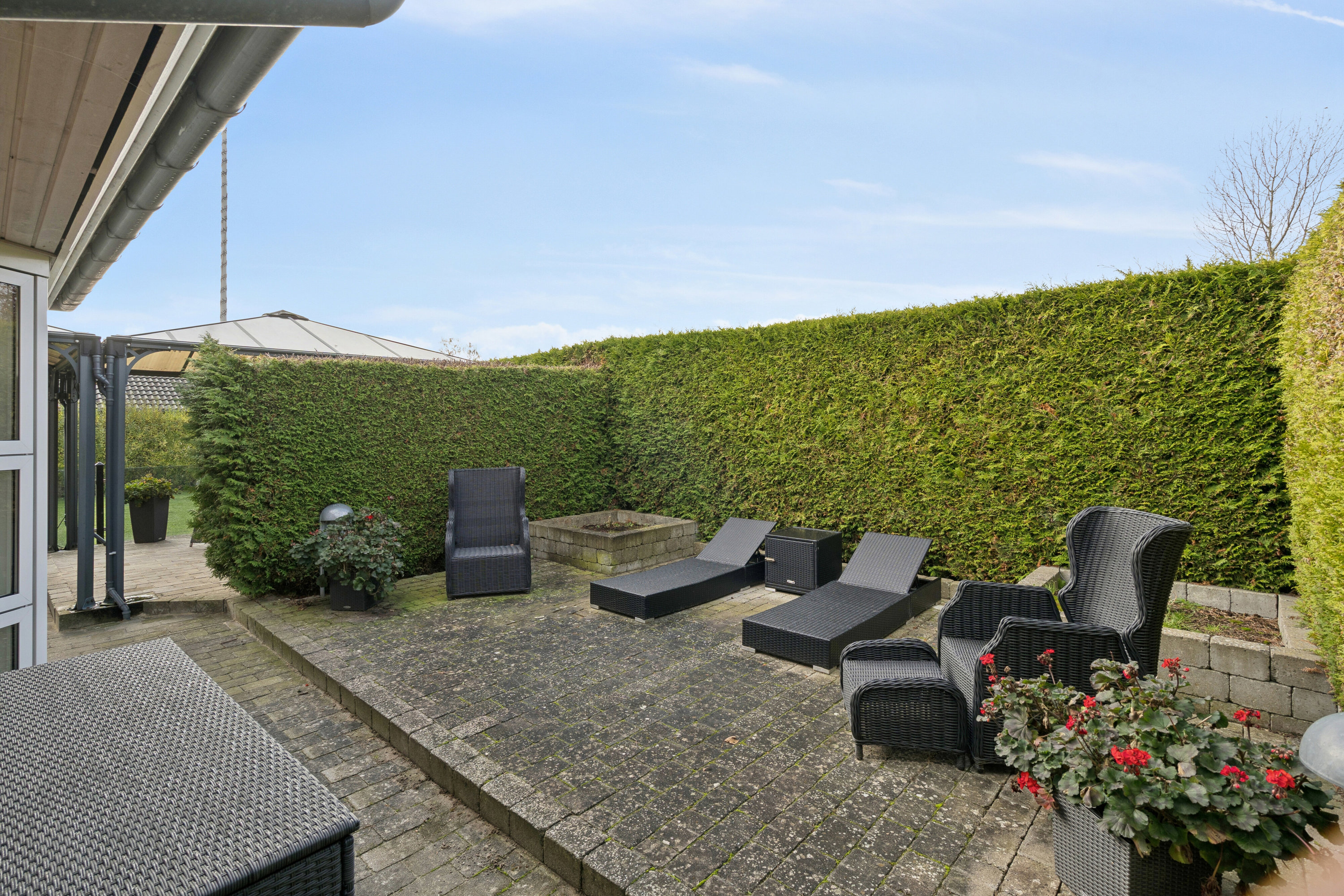 Fremhævet terrasse billede i fuldskærmstilstand. Billede af Brombærvej 25, 4654 Faxe Ladeplads