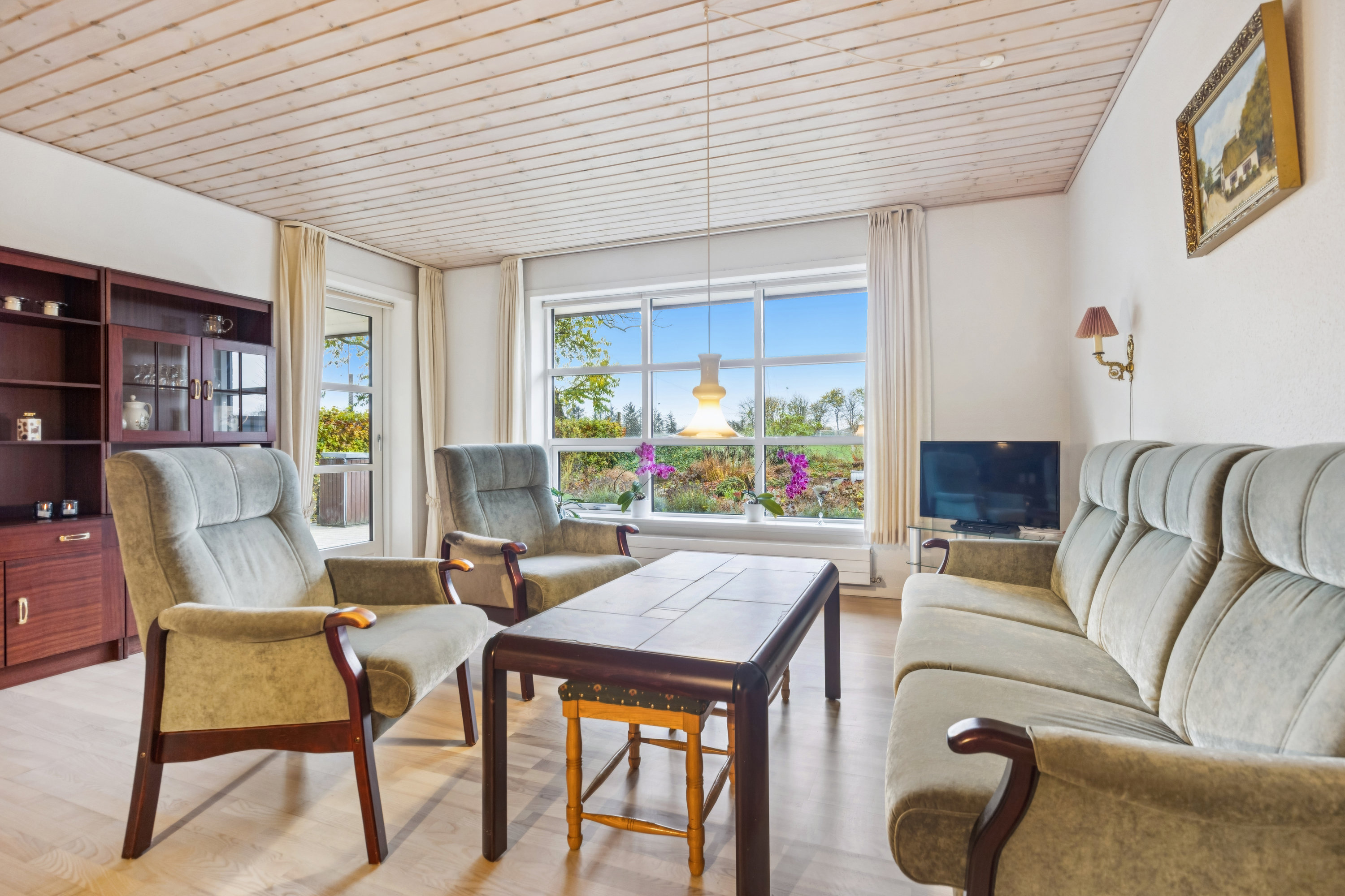 Fremhævet stue billede i fuldskærmstilstand. Billede af Østergade 46, 9320 Hjallerup