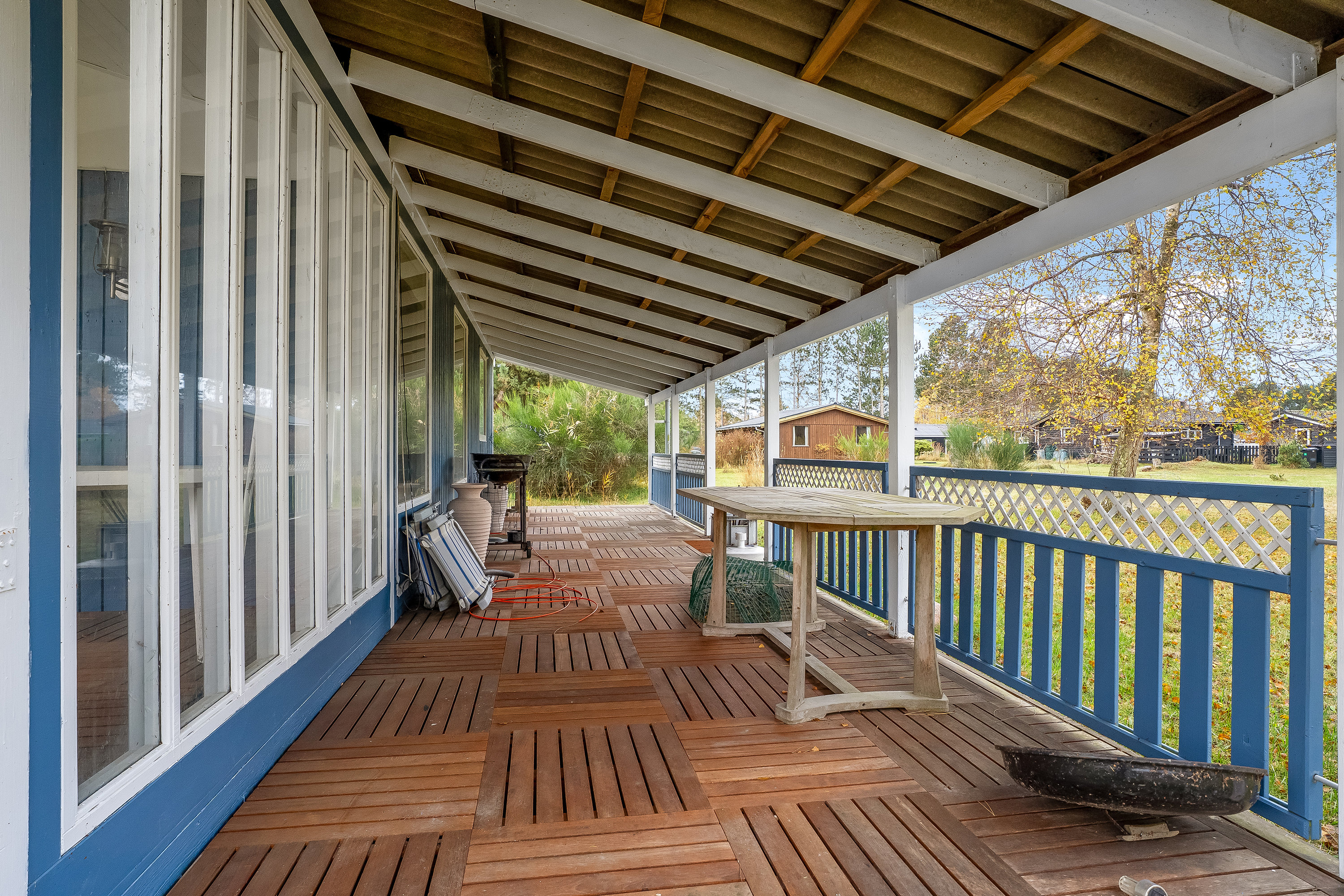 Fremhævet overdækket terrasse billede i fuldskærmstilstand. Billede af Solsortevænget 9, Saksfjed Ø, 4970 Rødby