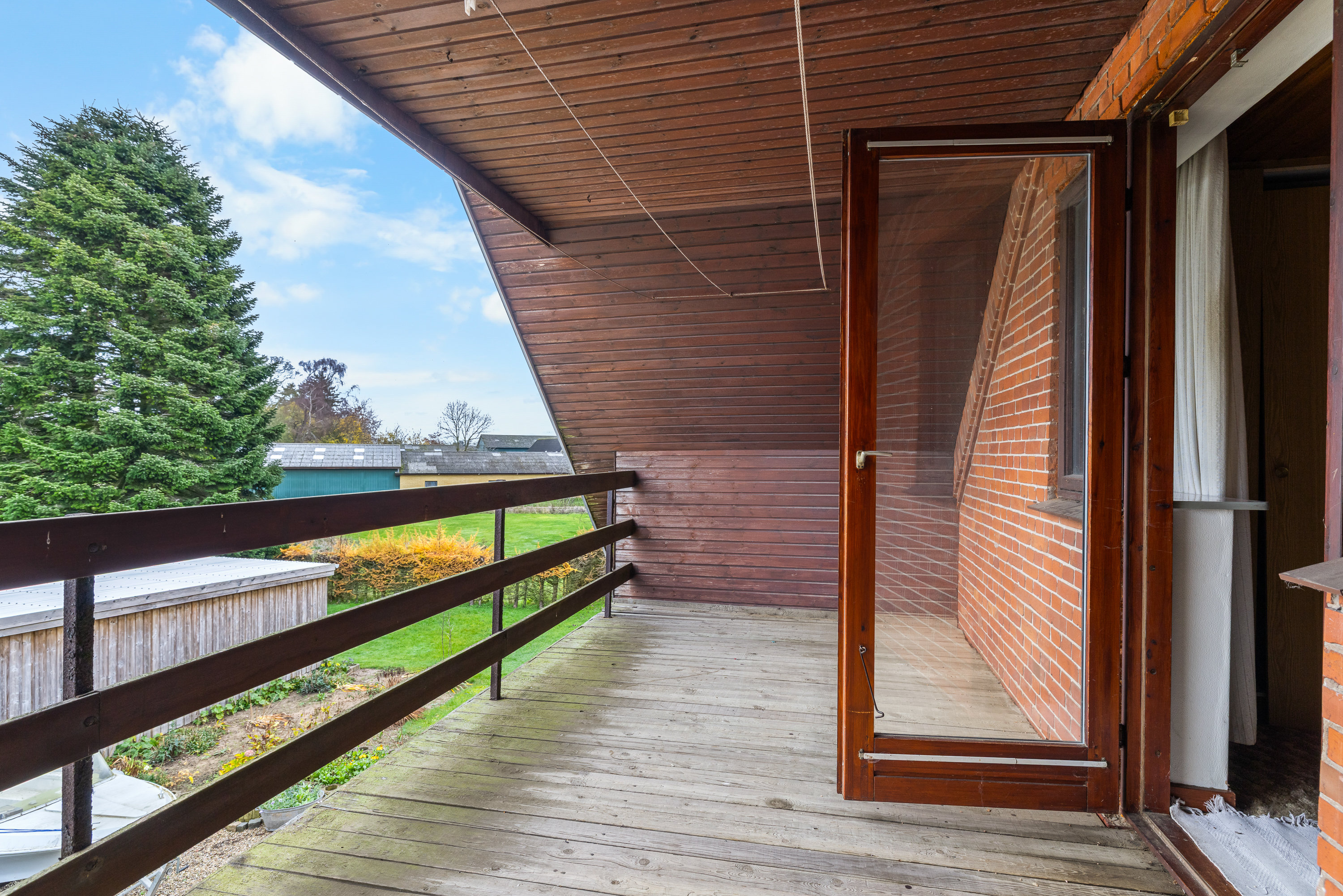 Fremhævet altan billede i fuldskærmstilstand. Billede af Brandholmvej 2, Ståby, 5672 Broby