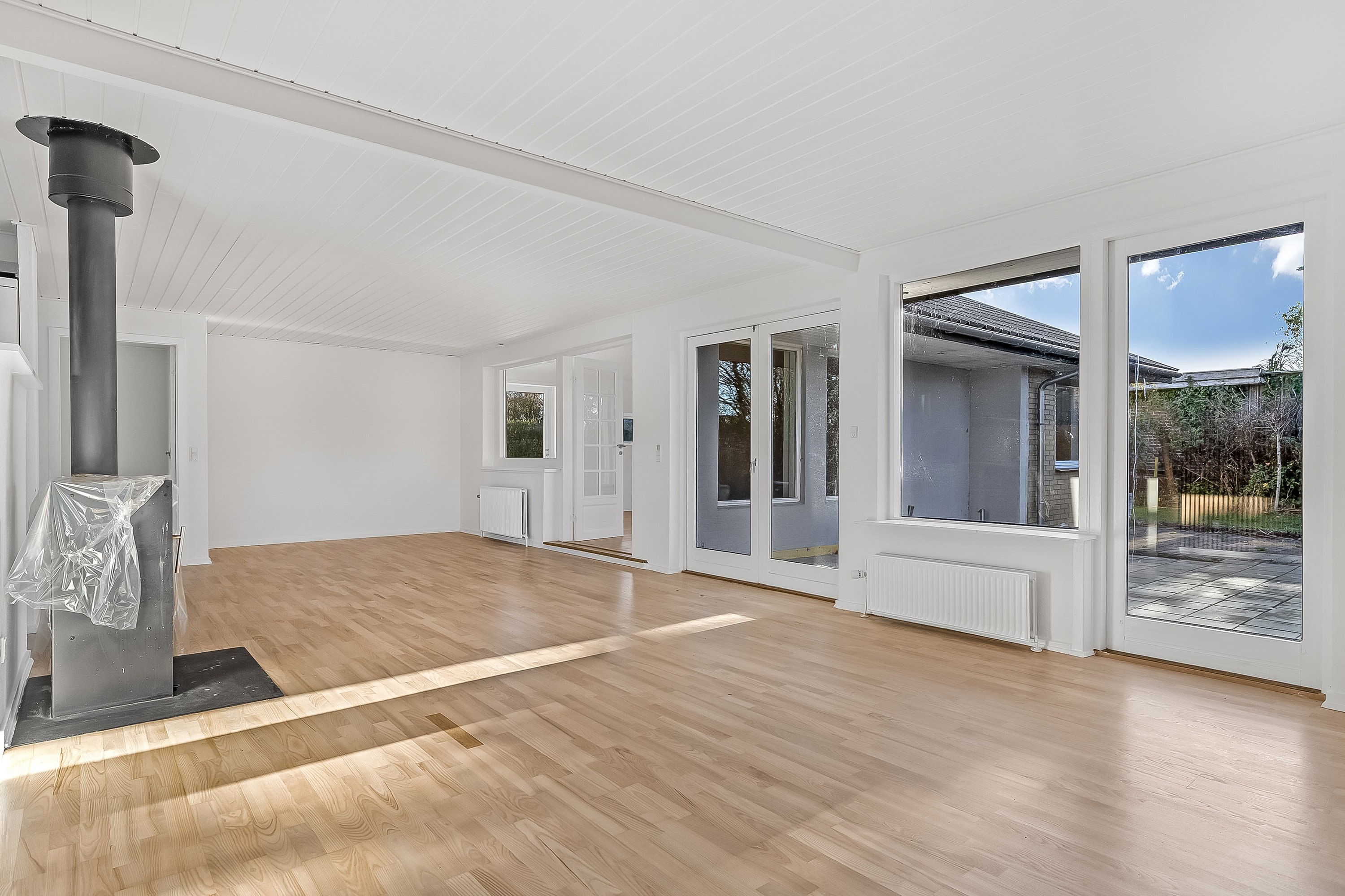 Fremhævet stue billede i fuldskærmstilstand. Billede af Sysselhaven 13, 6051 Almind