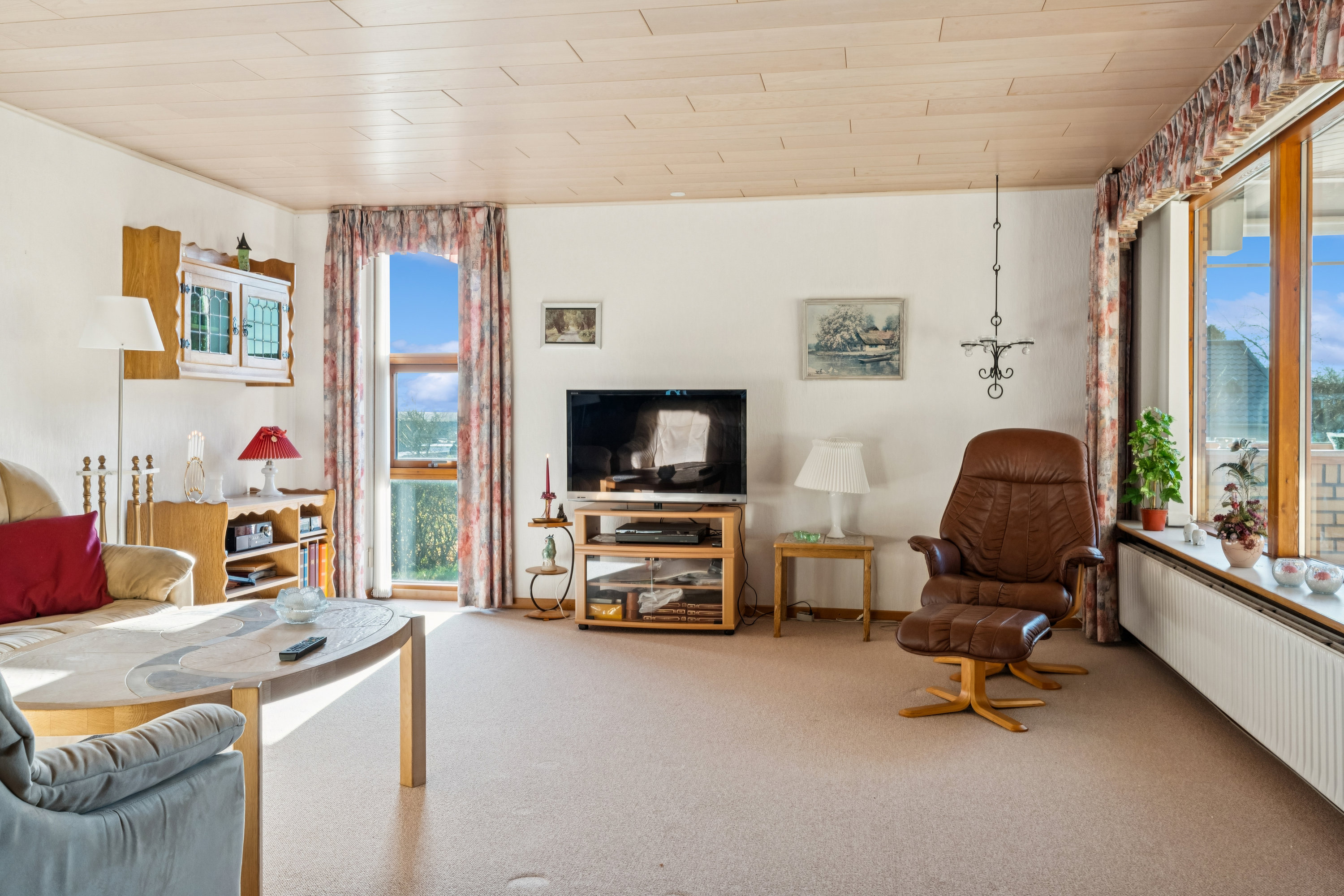 Fremhævet stue billede i fuldskærmstilstand. Billede af Tranebærvej 10, 9530 Støvring