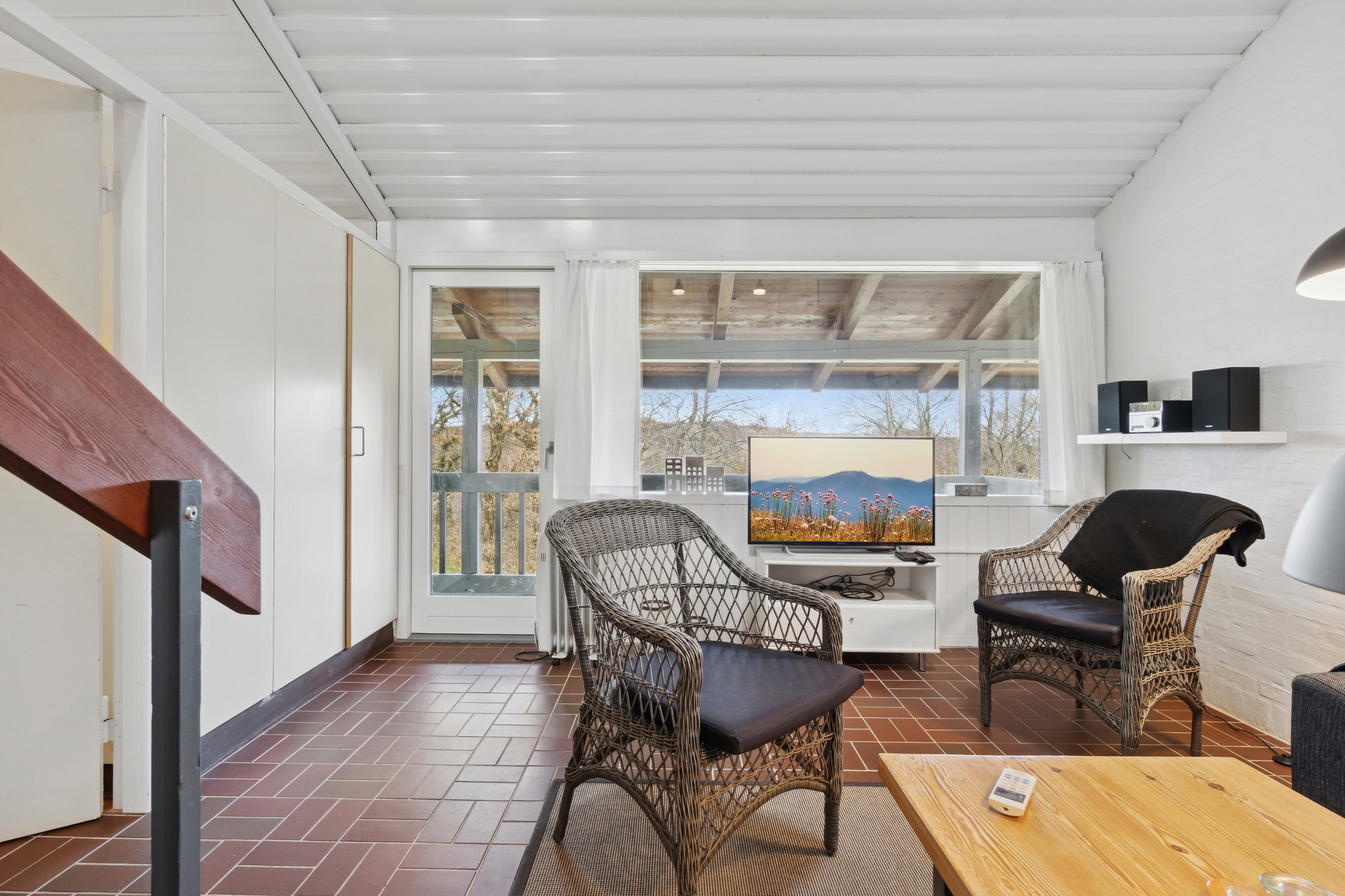 Fremhævet stue billede i fuldskærmstilstand. Billede af Langebjergvej 62, 27., Sandvig, 3770 Allinge