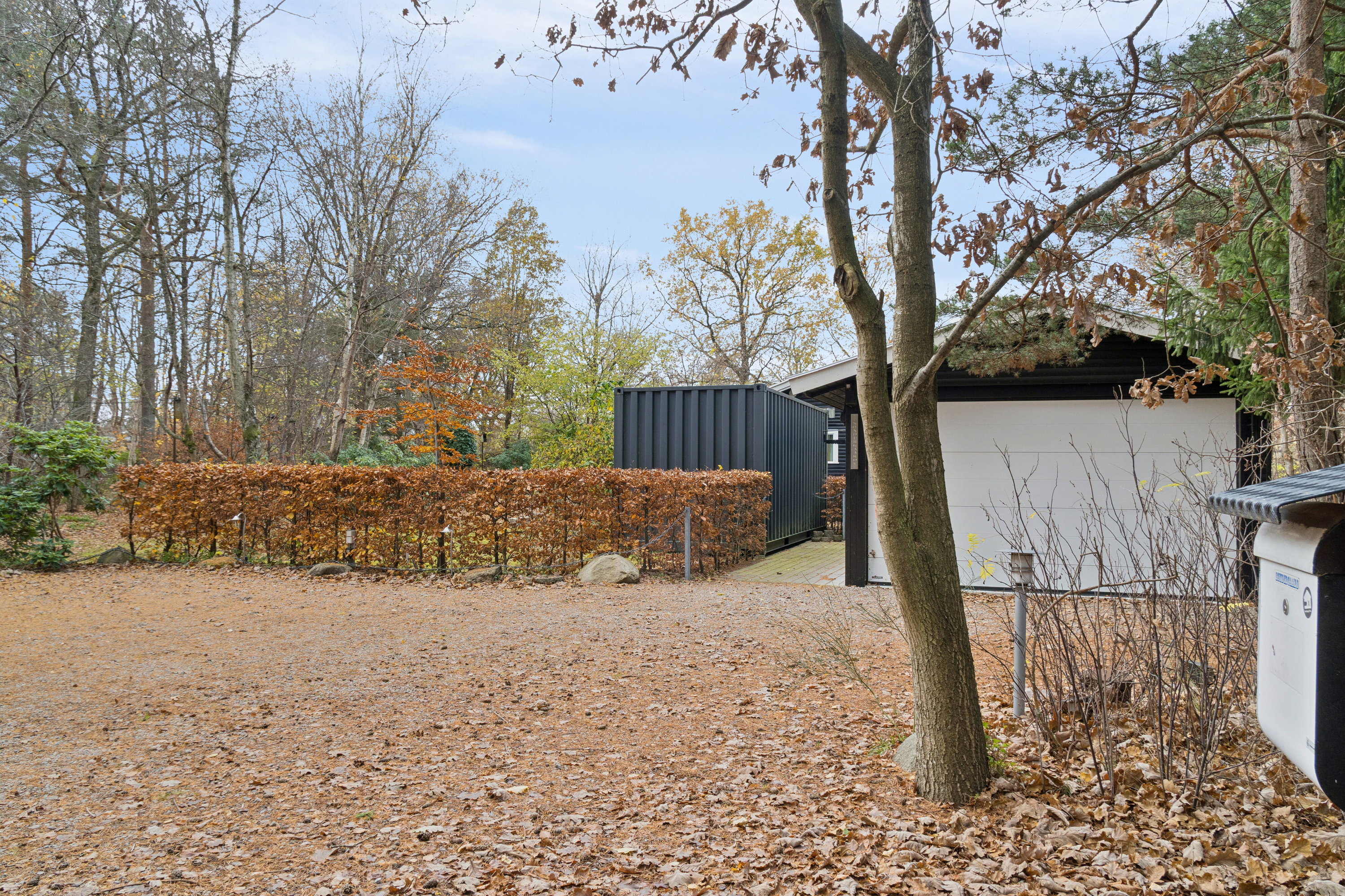 Fremhævet udendørs billede i fuldskærmstilstand. Billede af Gyvelvej 1, Asserbo, 3300 Frederiksværk