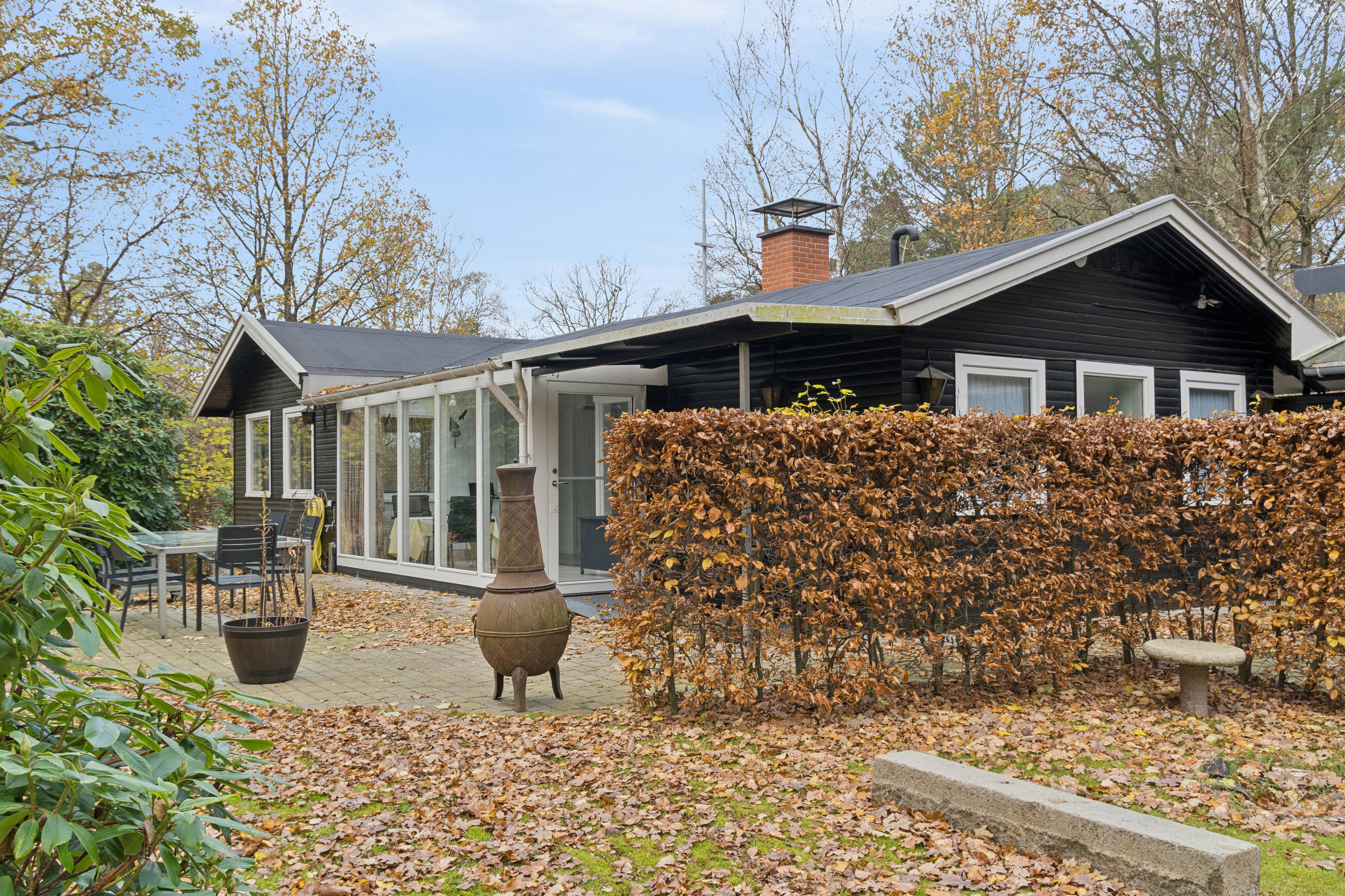 Fremhævet set fra haven billede i fuldskærmstilstand. Billede af Gyvelvej 1, Asserbo, 3300 Frederiksværk