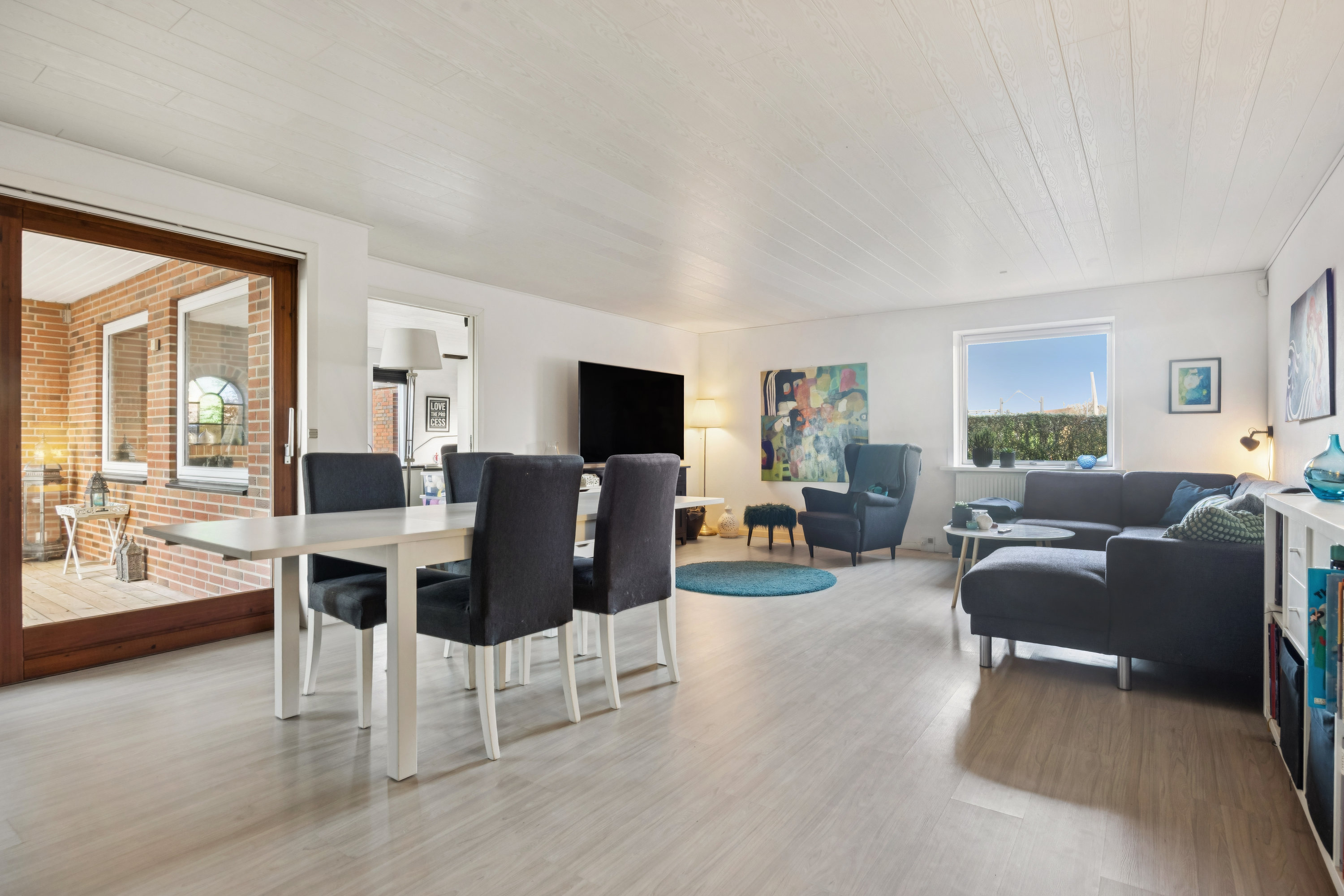 Fremhævet stue billede i fuldskærmstilstand. Billede af Kuskgårdsvej 16, 9381 Sulsted