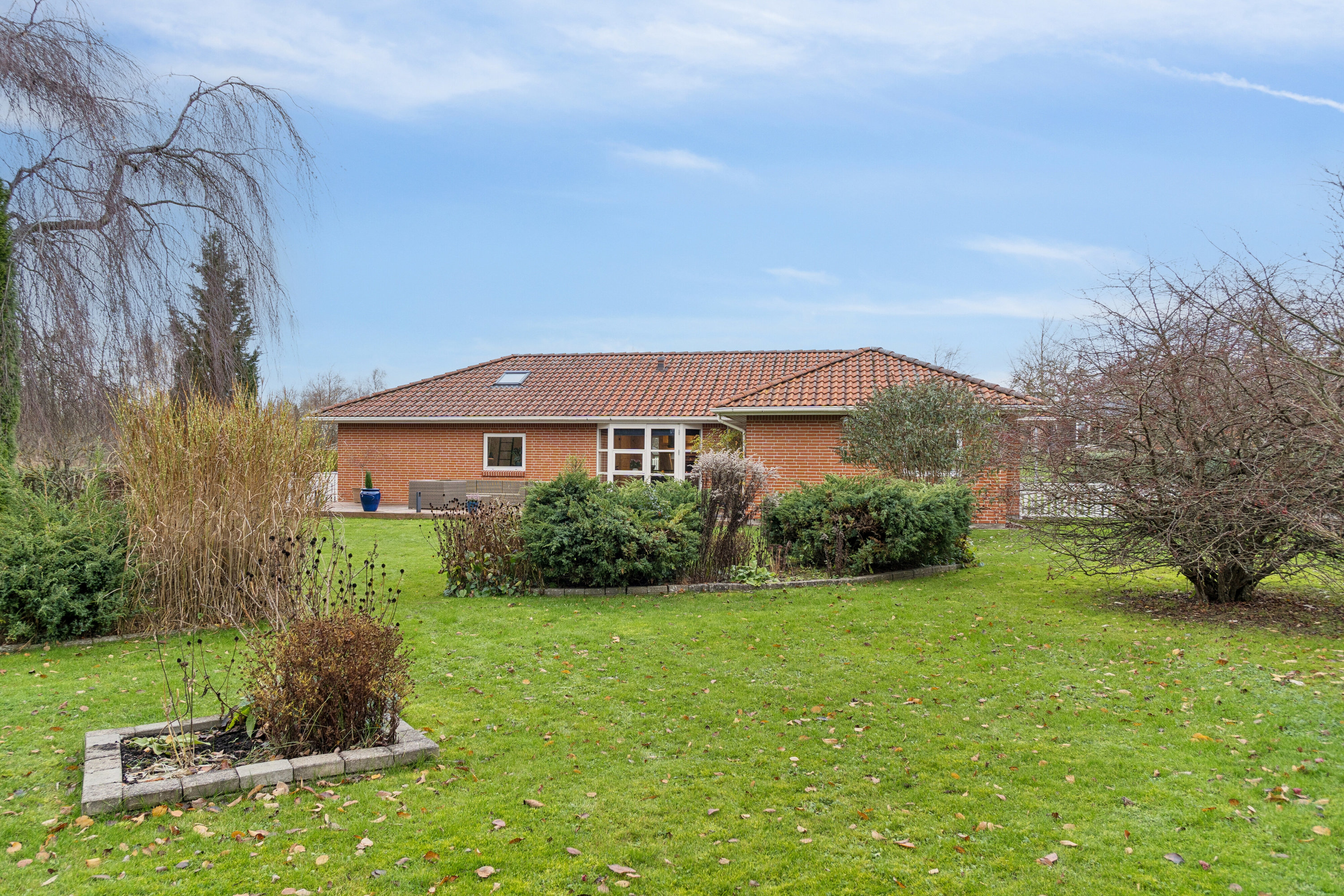 Fremhævet set fra haven billede i fuldskærmstilstand. Billede af Plantagevej 77, 5462 Morud