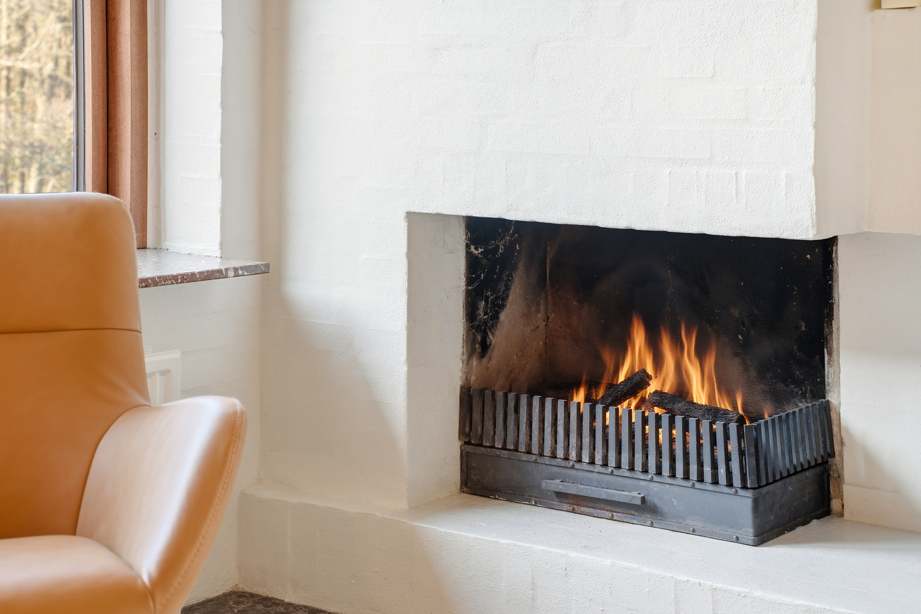 Fremhævet pejs billede i fuldskærmstilstand. Billede af Rypebakken 32, Snestrup, 5210 Odense NV