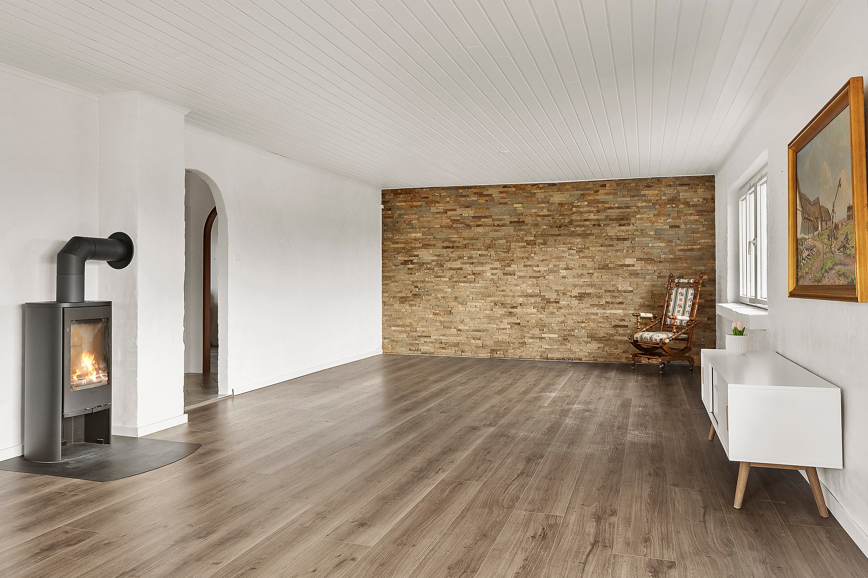 Fremhævet stue billede i fuldskærmstilstand. Billede af Østerbygårdvej 4, Ø Hovborg, 6682 Hovborg