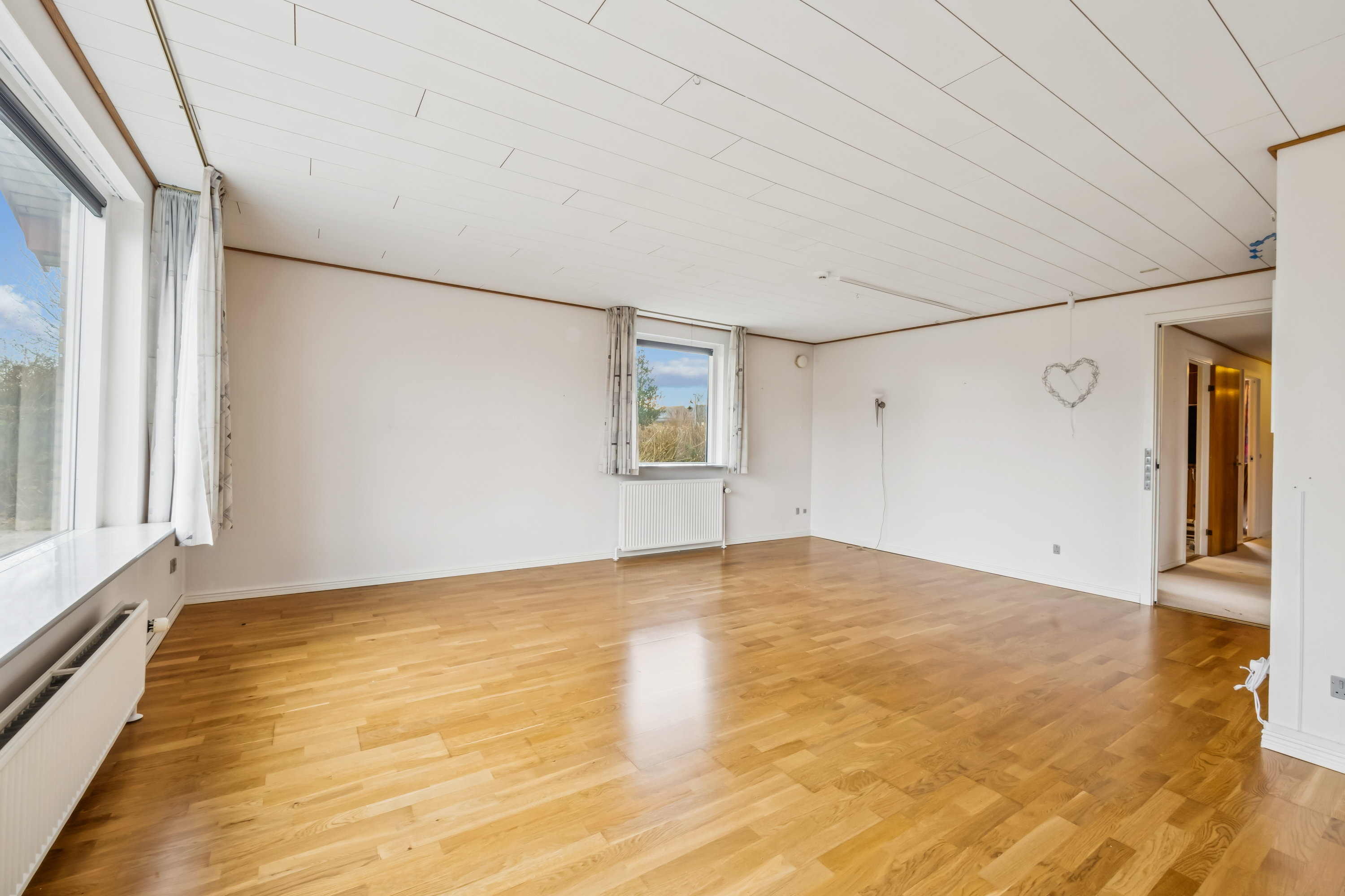 Fremhævet stue billede i fuldskærmstilstand. Billede af Tjørnevænget 42, 7800 Skive