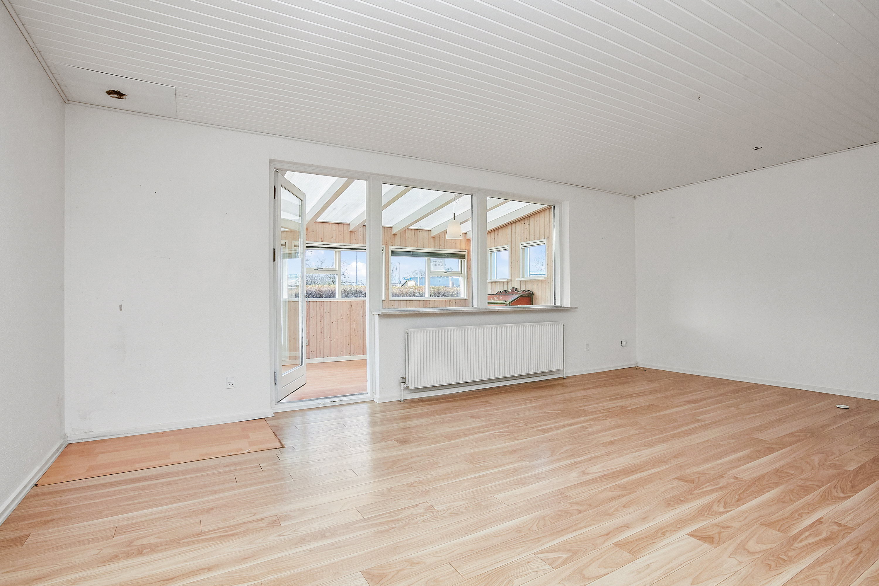 Fremhævet stue billede i fuldskærmstilstand. Billede af Rosavej 1B, 7160 Tørring