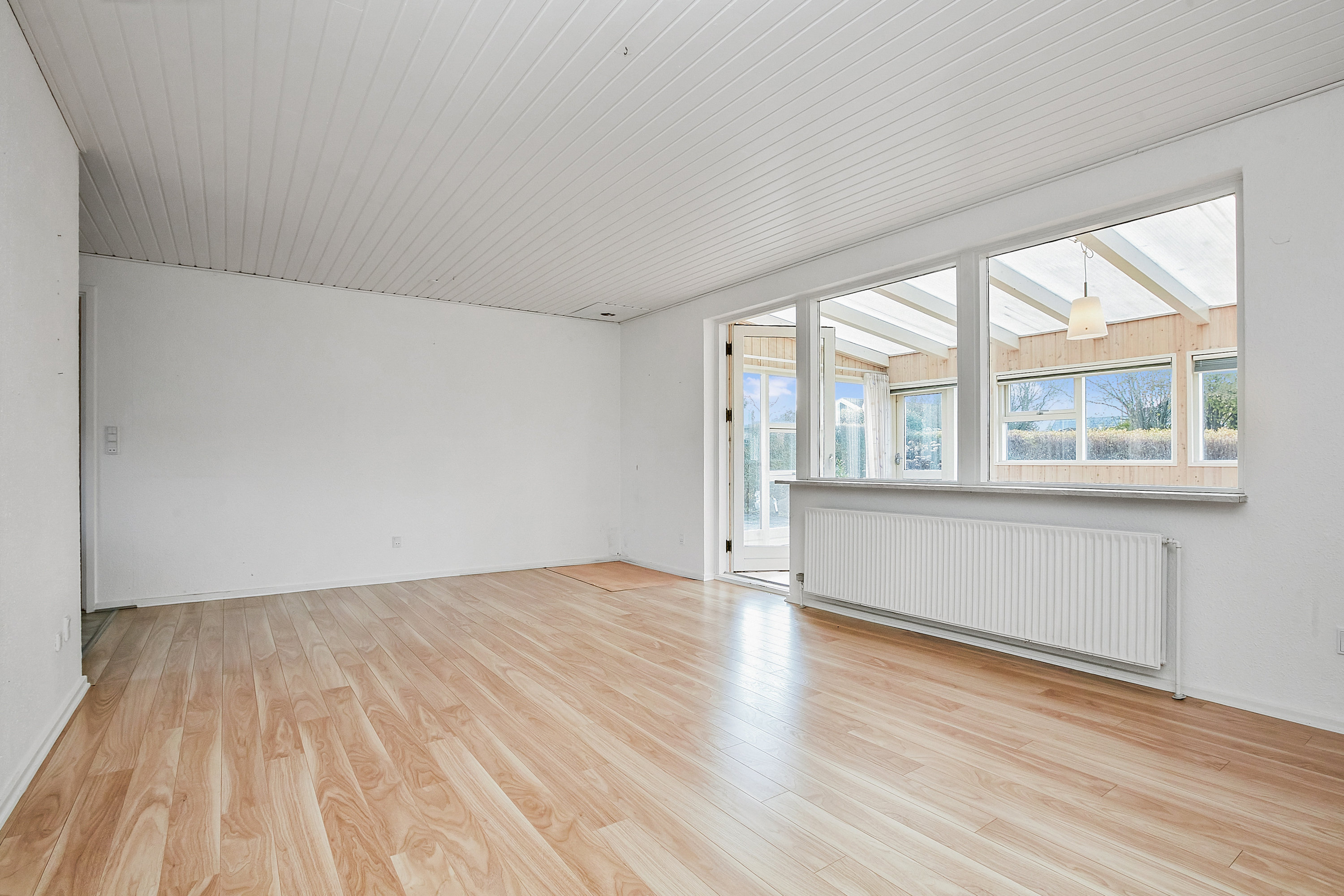 Fremhævet stue billede i fuldskærmstilstand. Billede af Rosavej 1B, 7160 Tørring