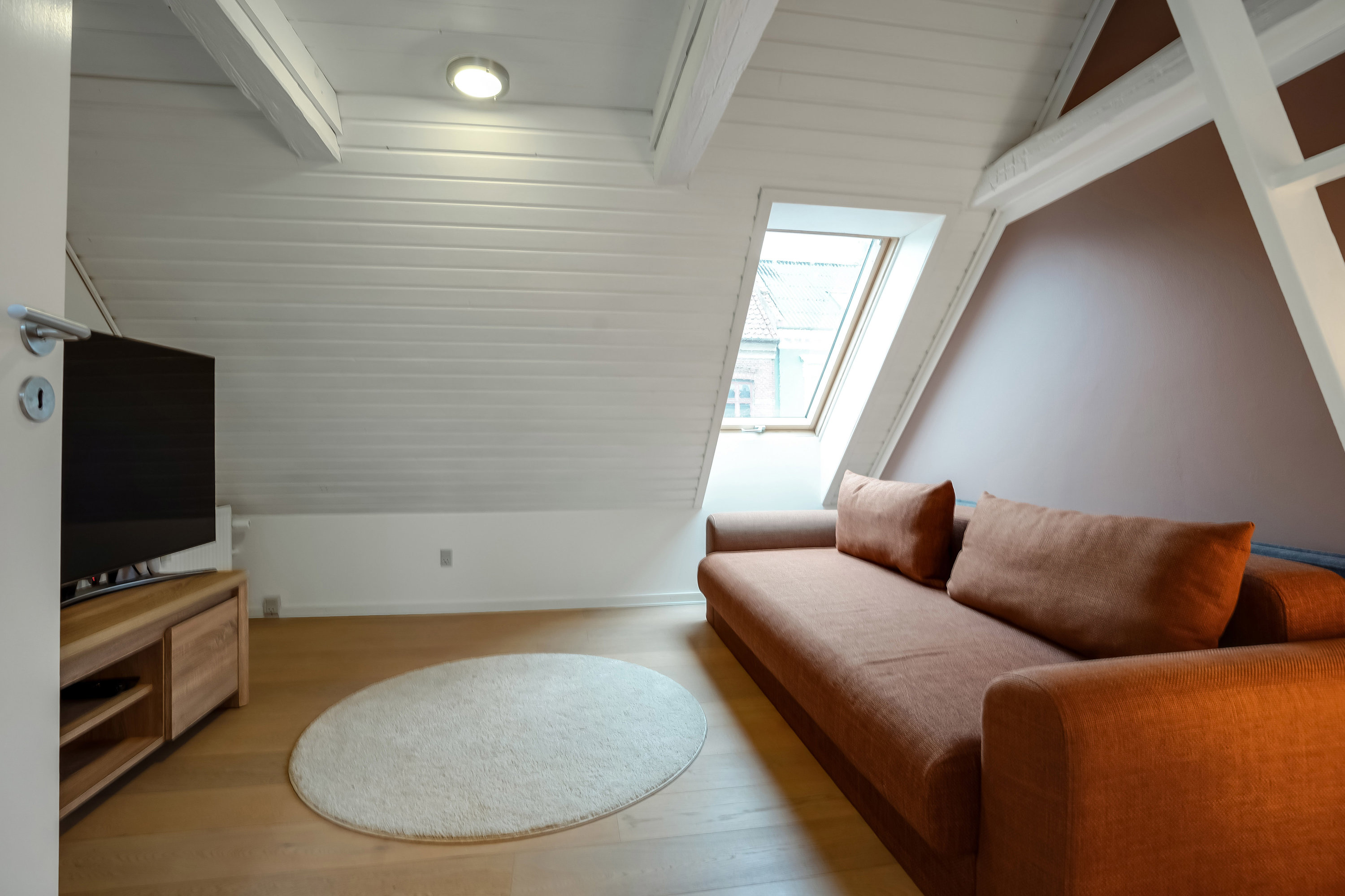 Fremhævet stue billede i fuldskærmstilstand. Billede af Vesterbro 80A, 5000 Odense C