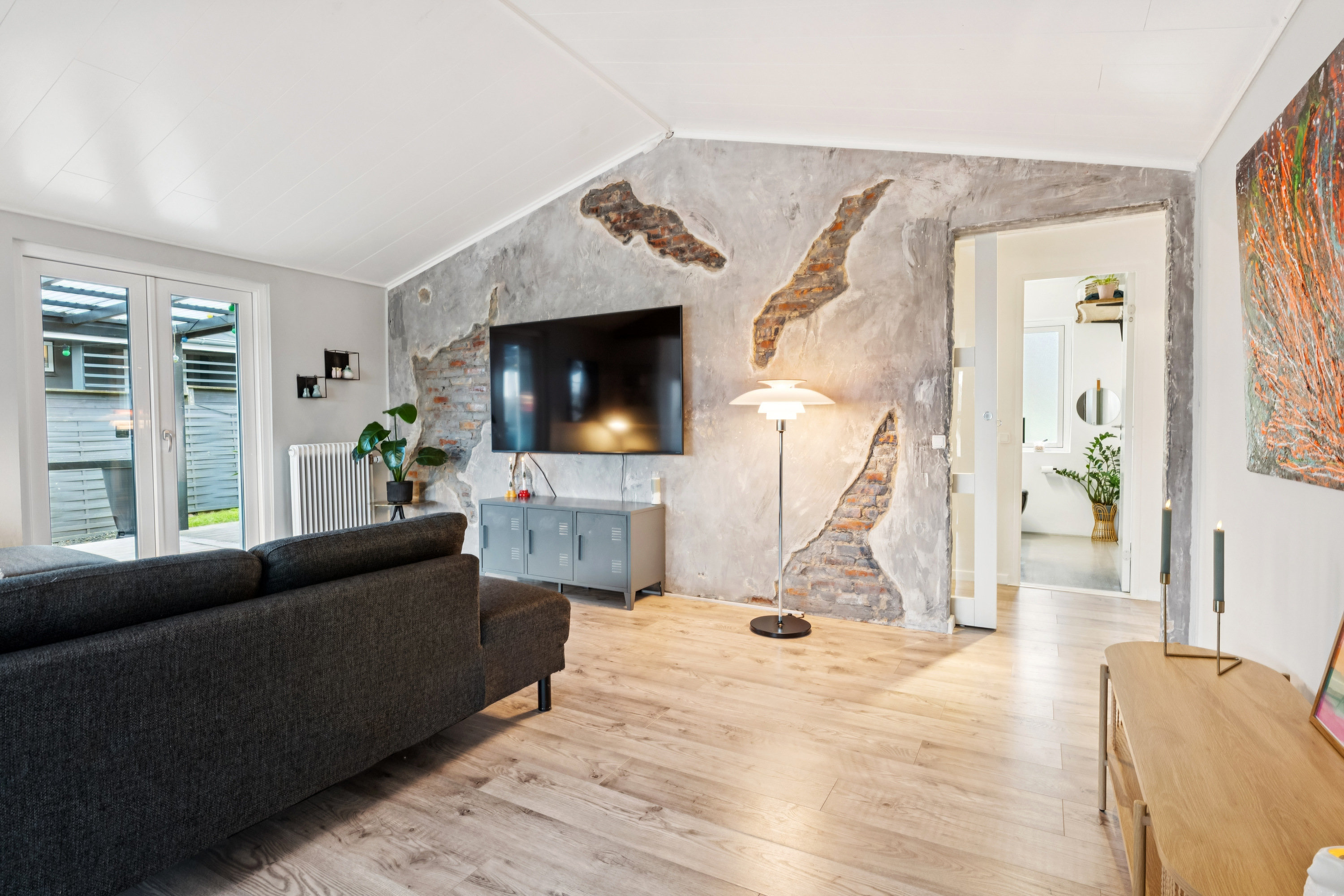 Fremhævet stue billede i fuldskærmstilstand. Billede af Rungsvej 58, 9200 Aalborg SV