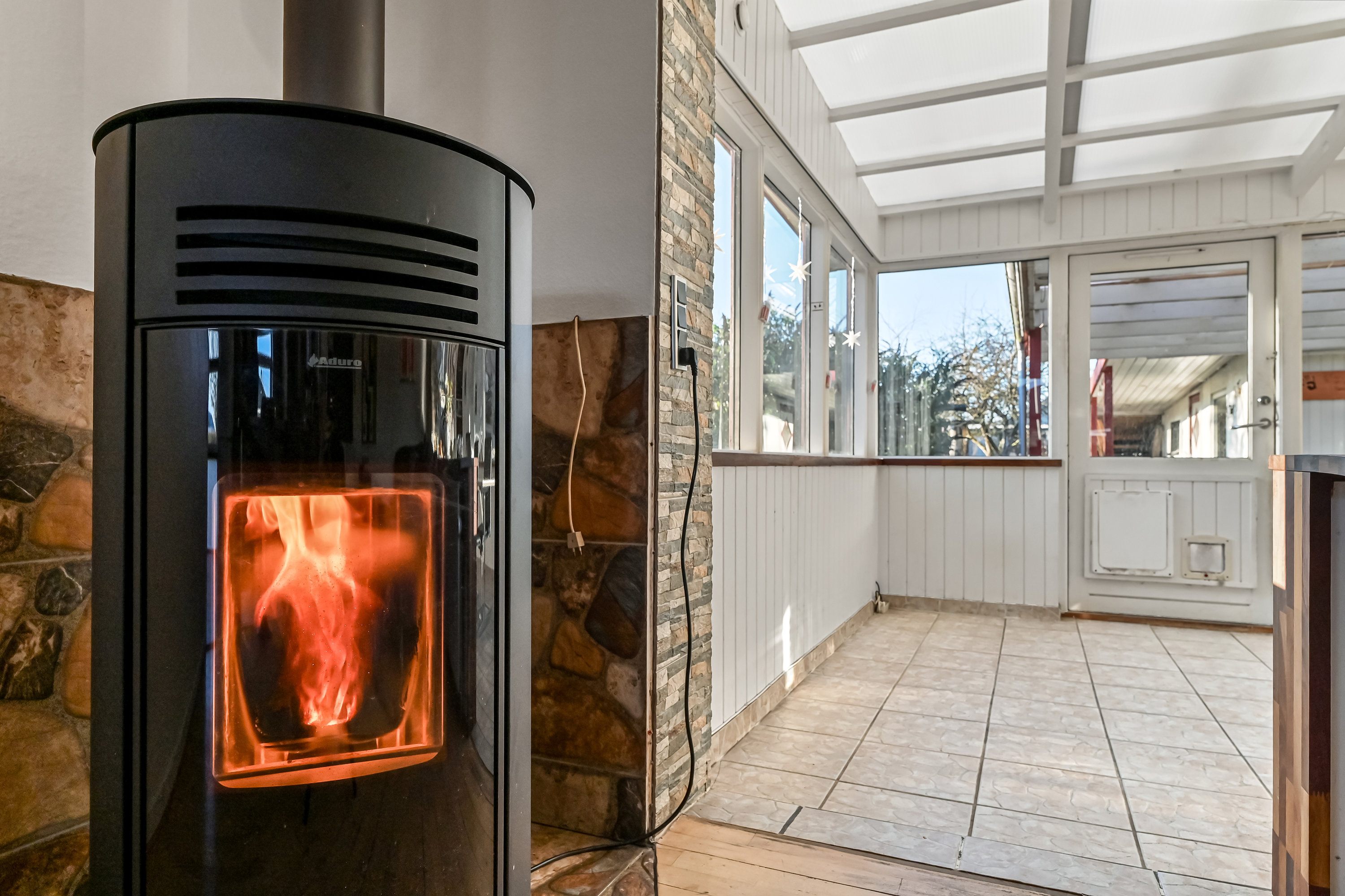 Fremhævet stue billede i fuldskærmstilstand. Billede af Ålholmvej 104, Tjørring, 7400 Herning