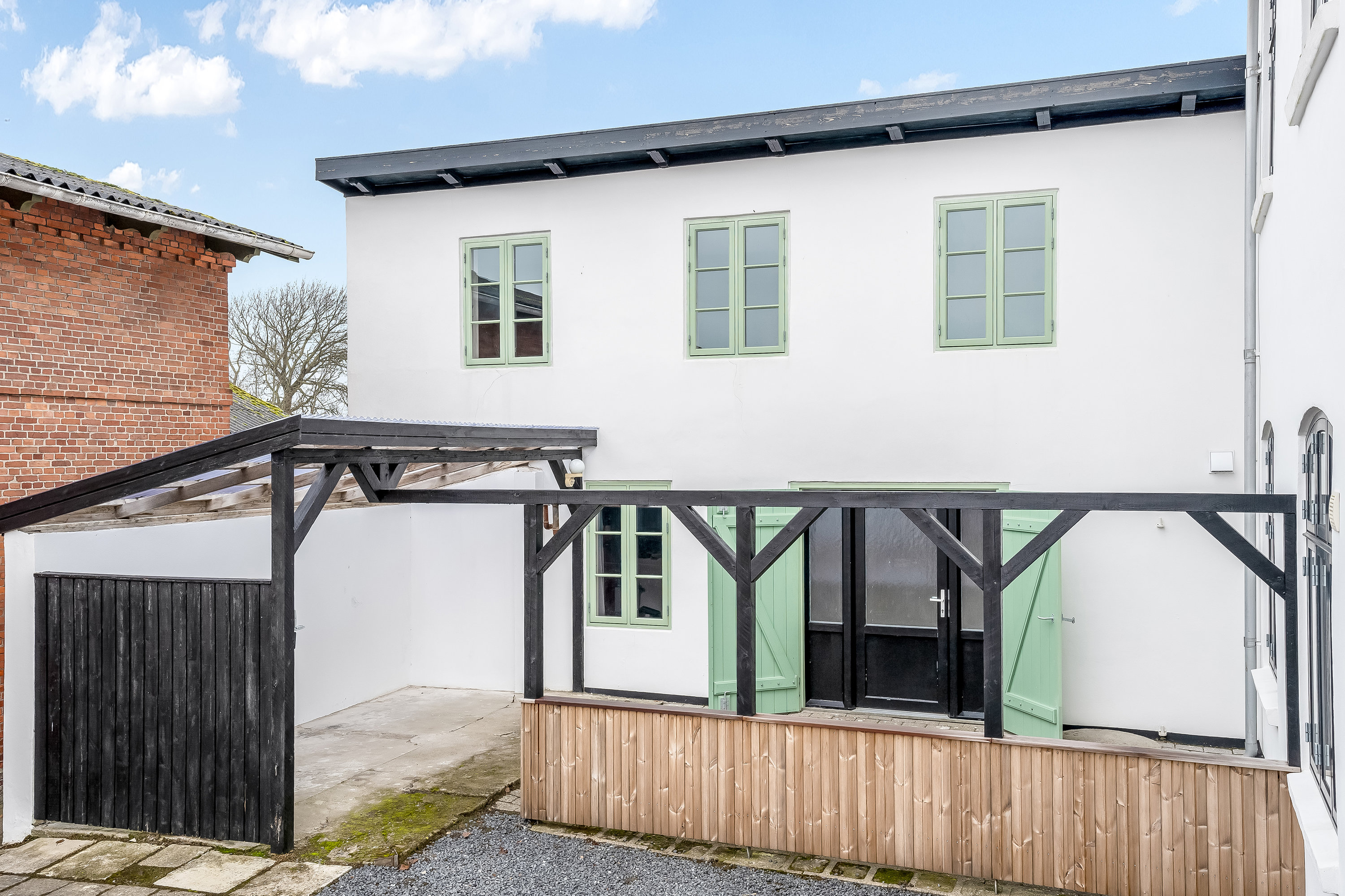 Fremhævet facade billede i fuldskærmstilstand. Billede af Ballumvej 1, 6280 Højer