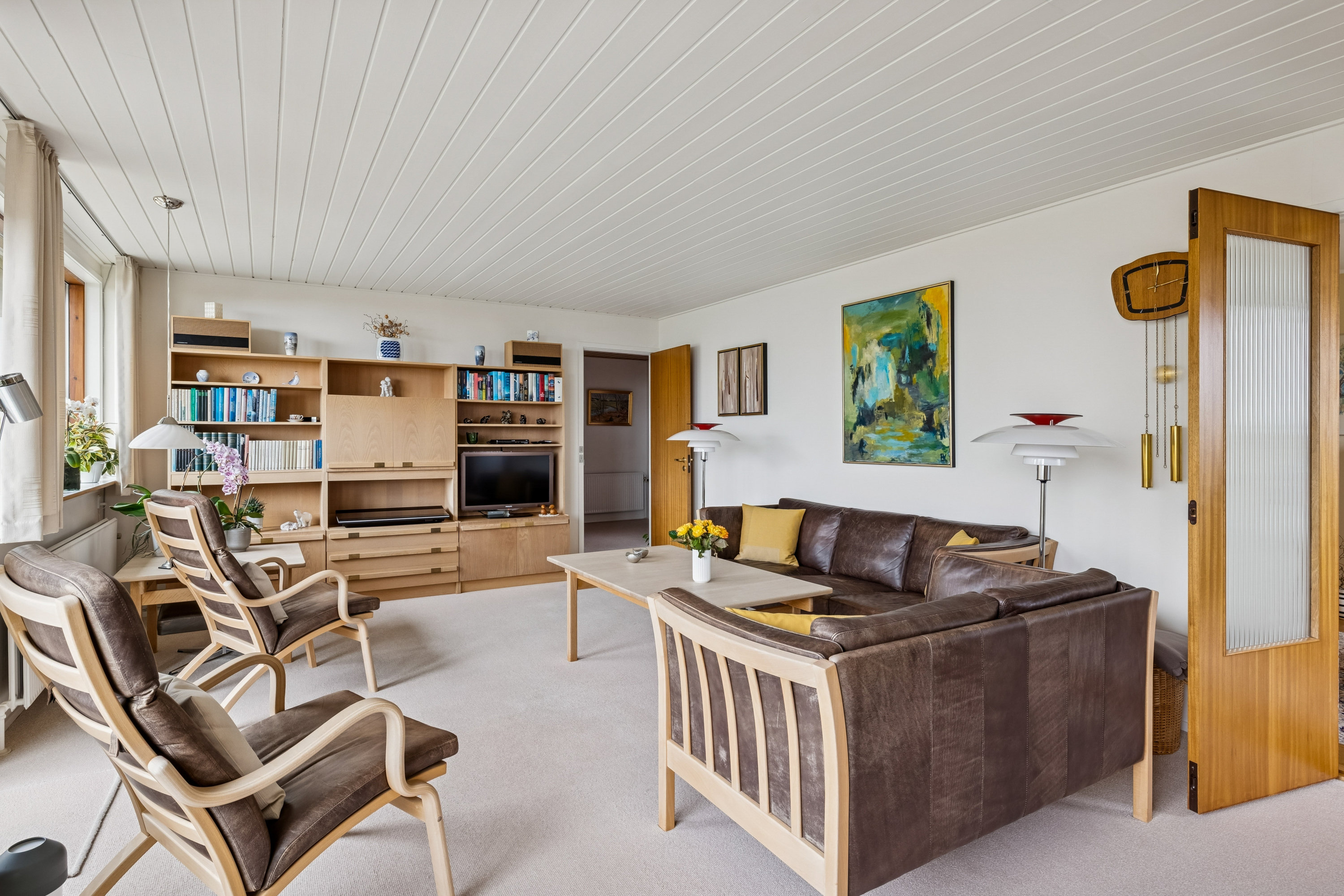 Fremhævet stue billede i fuldskærmstilstand. Billede af Rosenhøjvej 21, Ugelbølle, 8410 Rønde