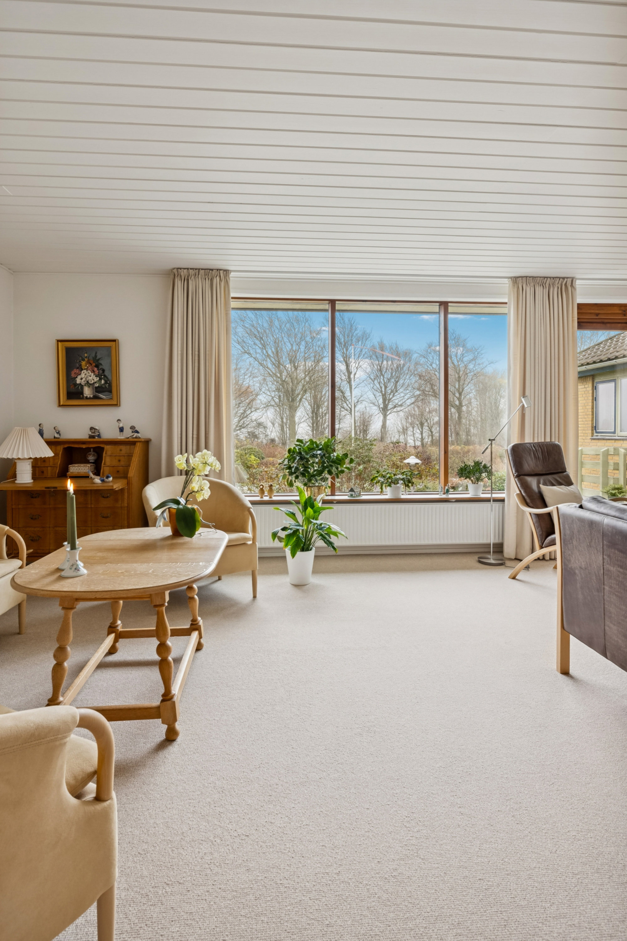 Fremhævet stue billede i fuldskærmstilstand. Billede af Rosenhøjvej 21, Ugelbølle, 8410 Rønde