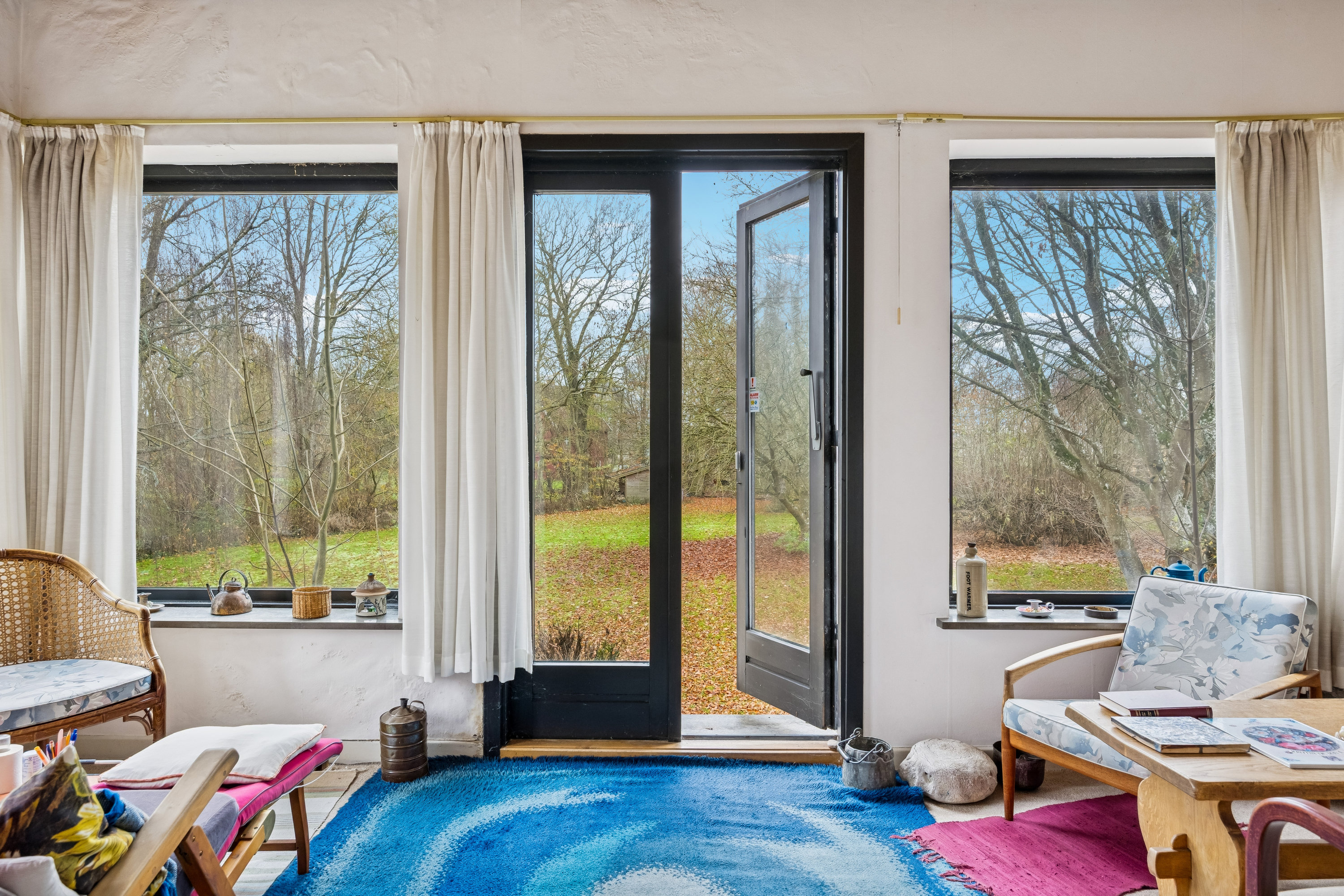 Fremhævet udestue billede i fuldskærmstilstand. Billede af Rougsøvej 30, Spidsborg, 8961 Allingåbro