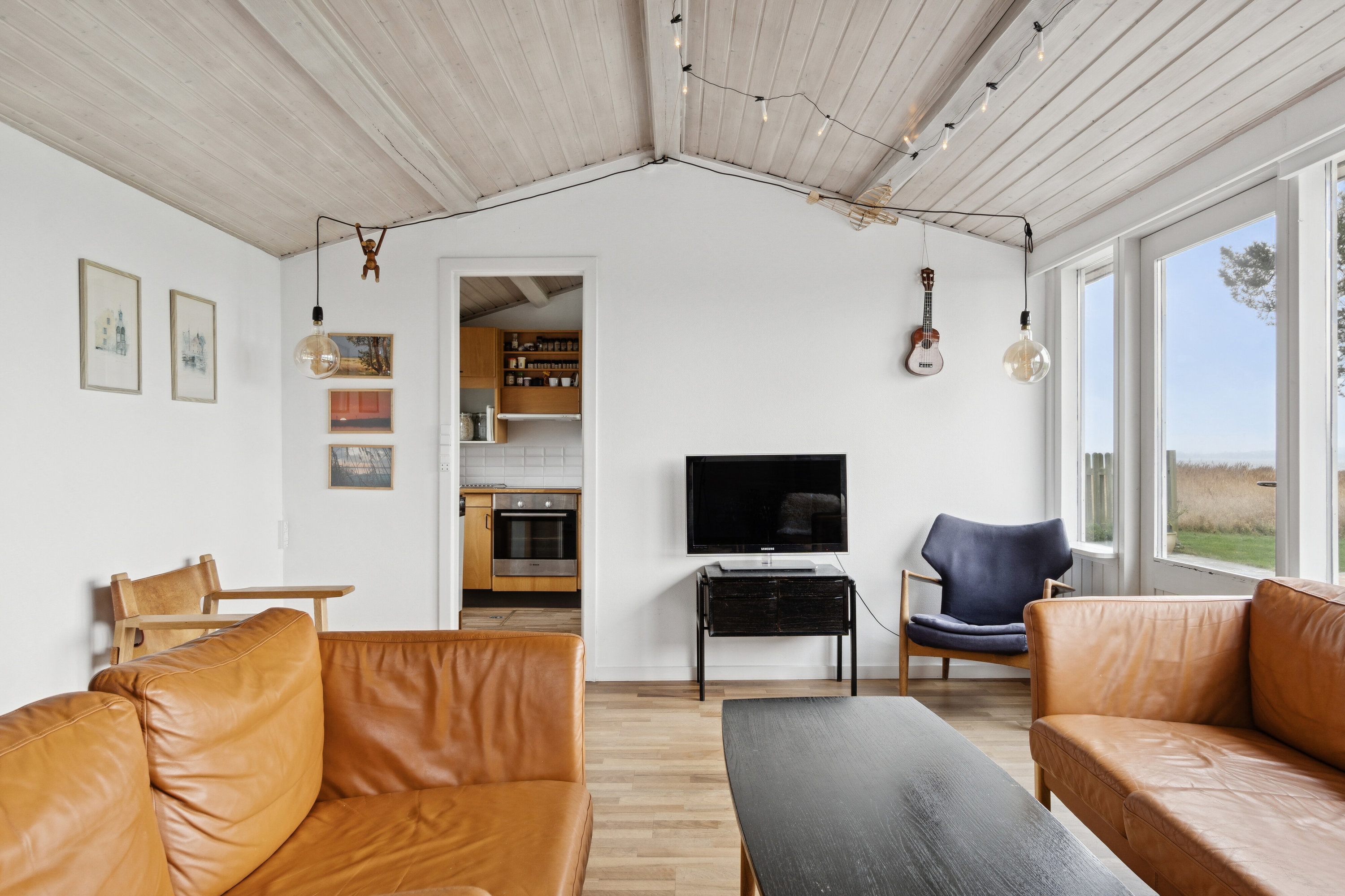 Fremhævet stue billede i fuldskærmstilstand. Billede af Fyrrevang 13, Abildøre, 4560 Vig