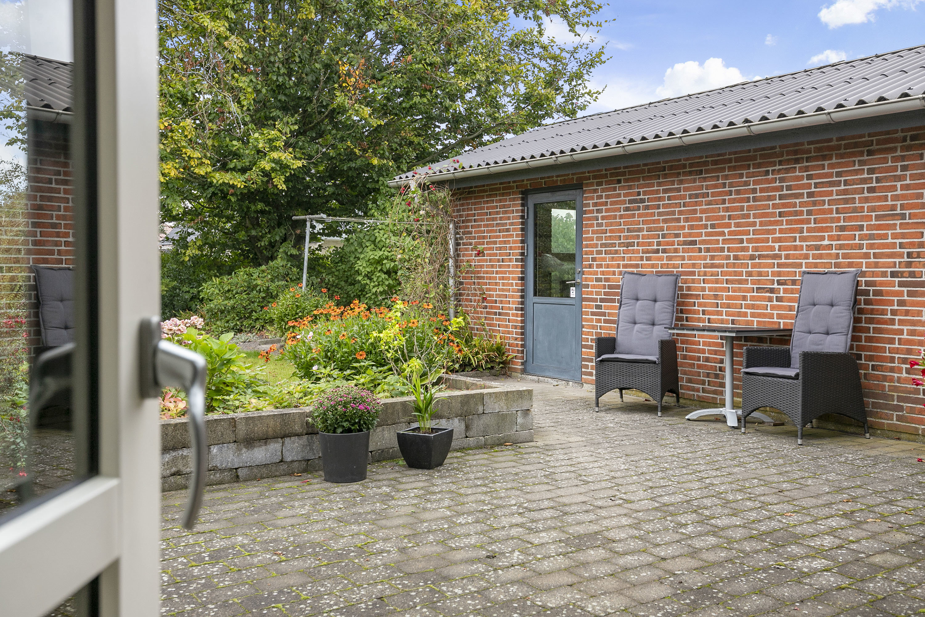 Fremhævet terrasse billede i fuldskærmstilstand. Billede af Valmuemarken 14, 9690 Fjerritslev