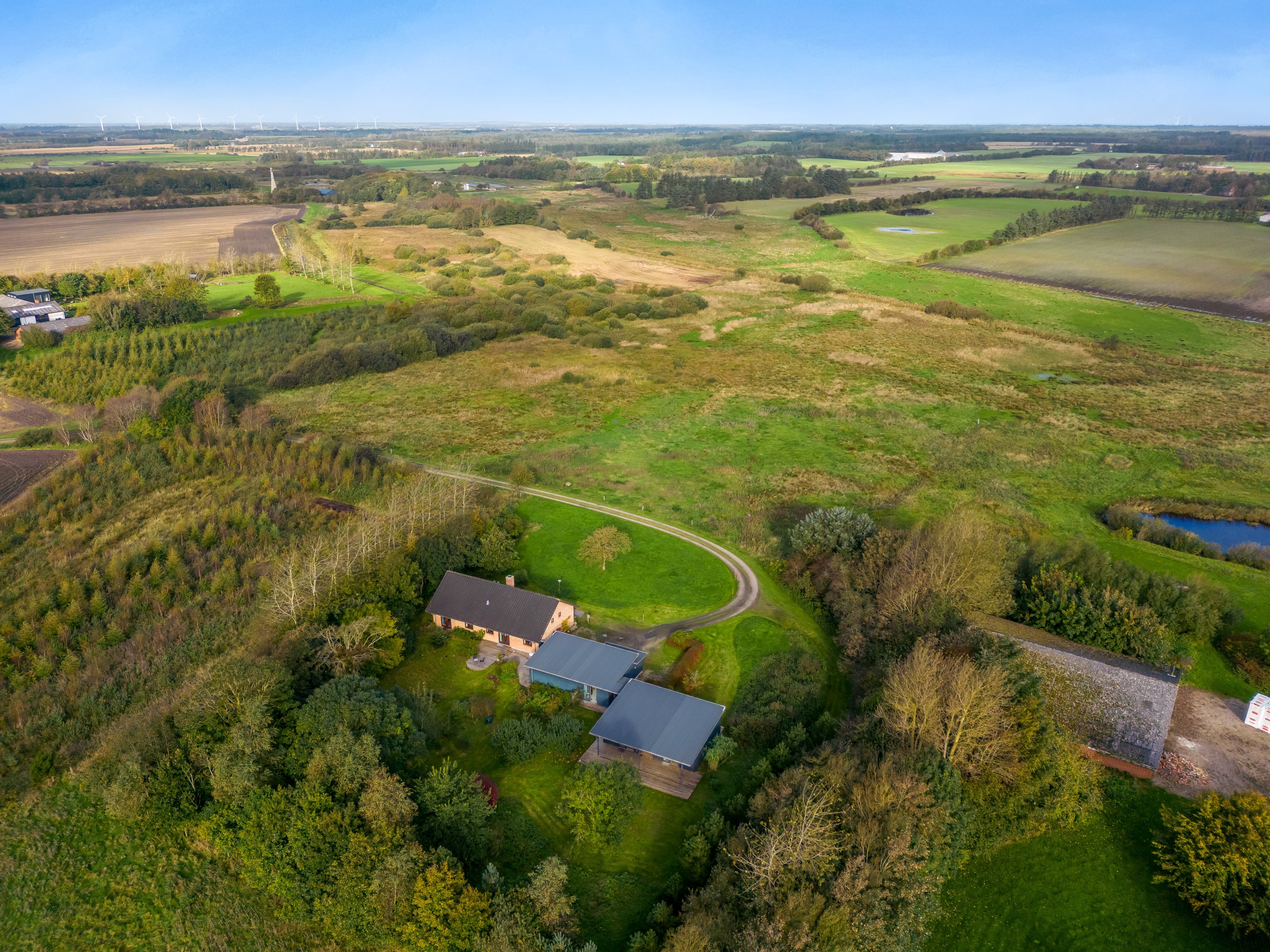 Fremhævet luftfoto billede i fuldskærmstilstand. Billede af Torstedvej 96, 6980 Tim