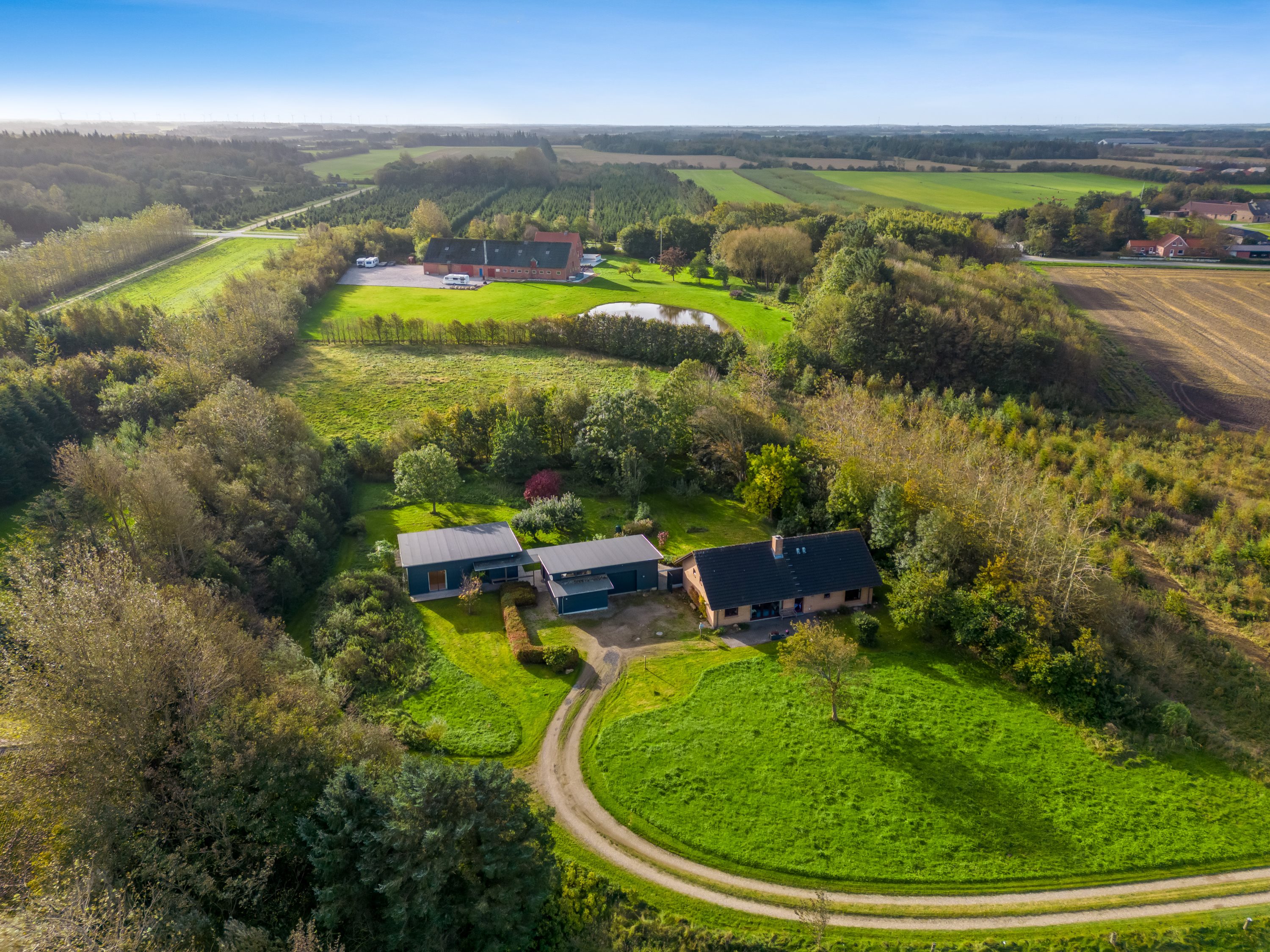 Fremhævet luftfoto billede i fuldskærmstilstand. Billede af Torstedvej 96, 6980 Tim