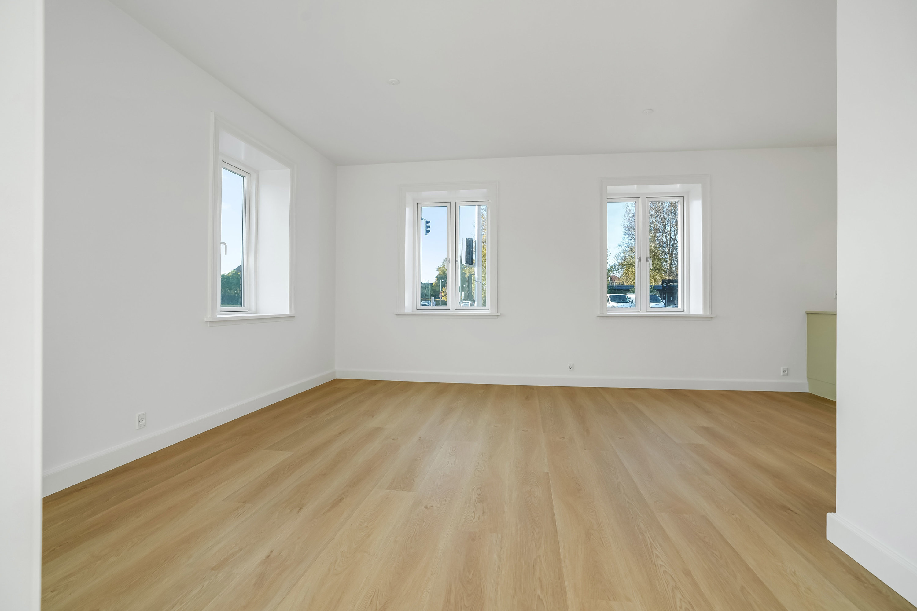 Fremhævet stue billede i fuldskærmstilstand. Billede af Christmas Møllers Vej 13, 1. 1., Bolbro, 5200 Odense V