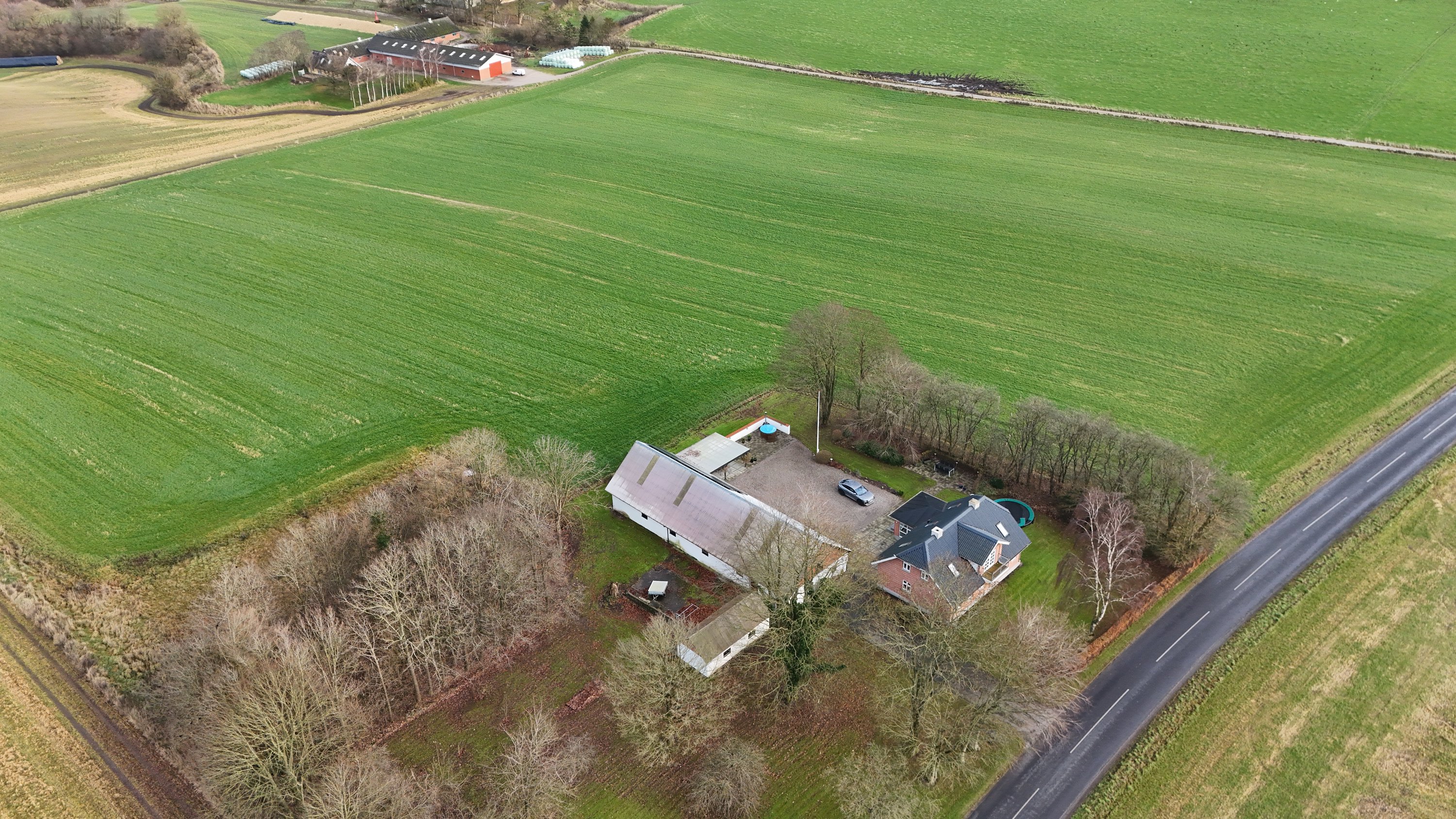 Fremhævet luftfoto billede i fuldskærmstilstand. Billede af Hannerupvej 299, 9500 Hobro
