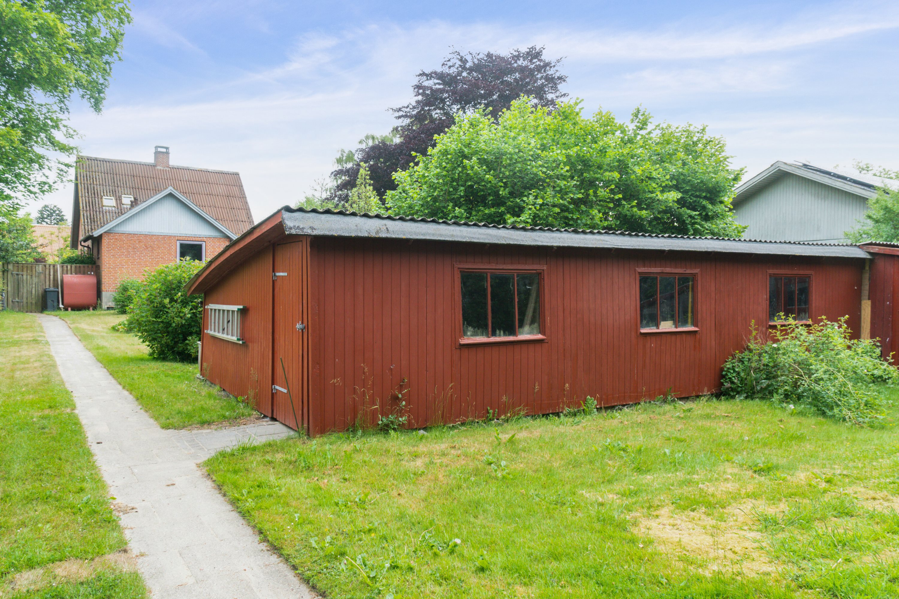 Fremhævet set fra haven billede i fuldskærmstilstand. Billede af Vestergårdsvej 4, Boulstrup, 8300 Odder