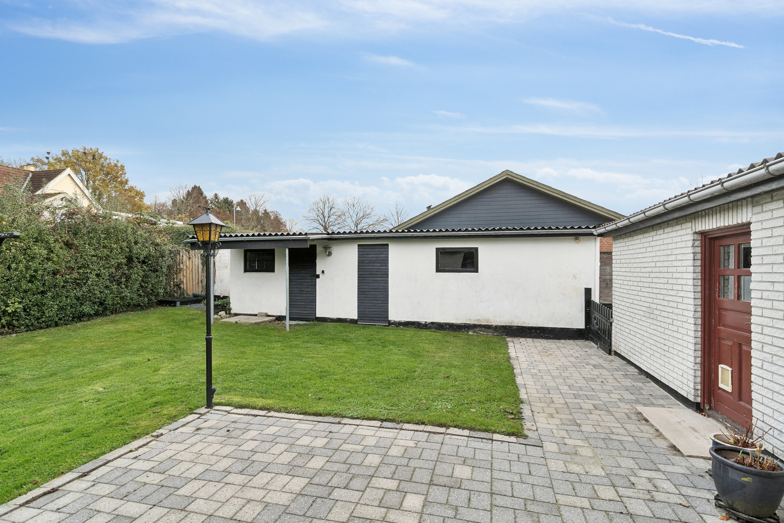 Fremhævet udendørs billede i fuldskærmstilstand. Billede af Parkvej 2B, 4640 Faxe