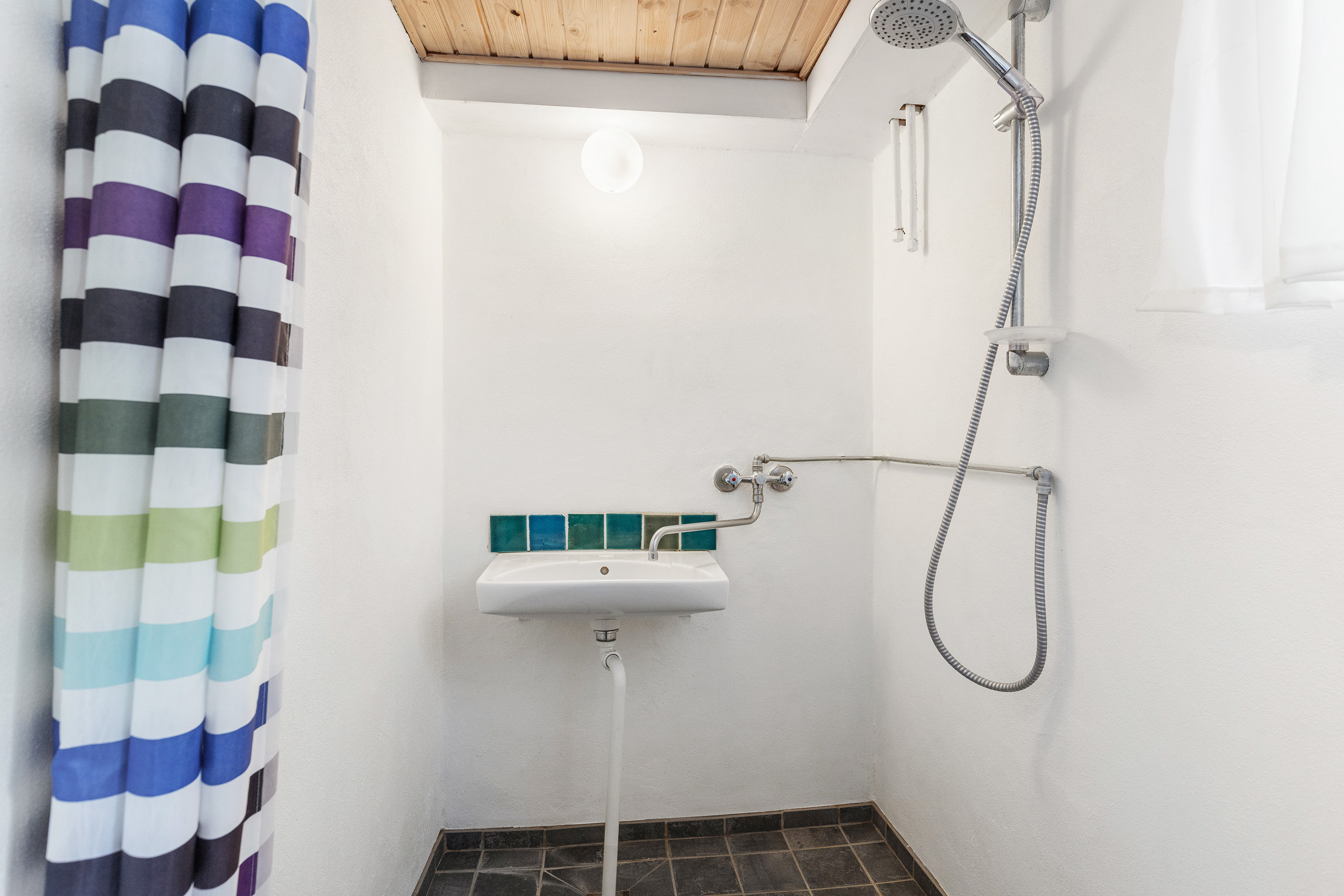 Fremhævet badeværelse billede i fuldskærmstilstand. Billede af Brøndumvej 33, 9690 Fjerritslev