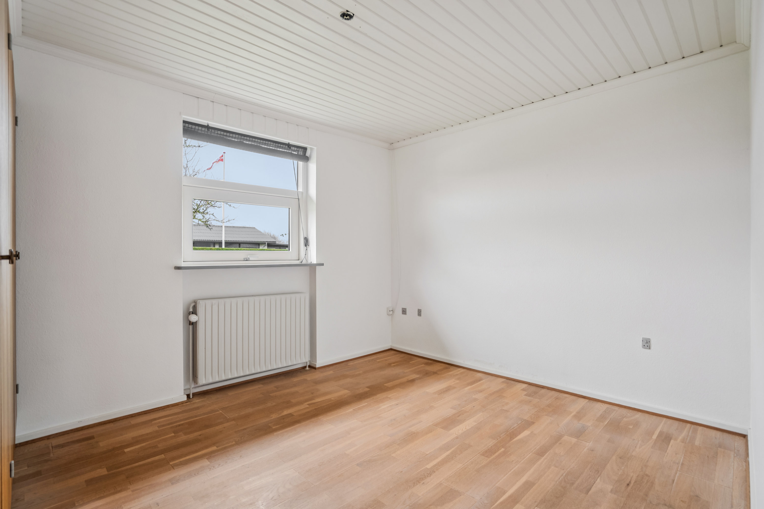 Fremhævet stue billede i fuldskærmstilstand. Billede af Søren Toftsvej 12, 9850 Hirtshals