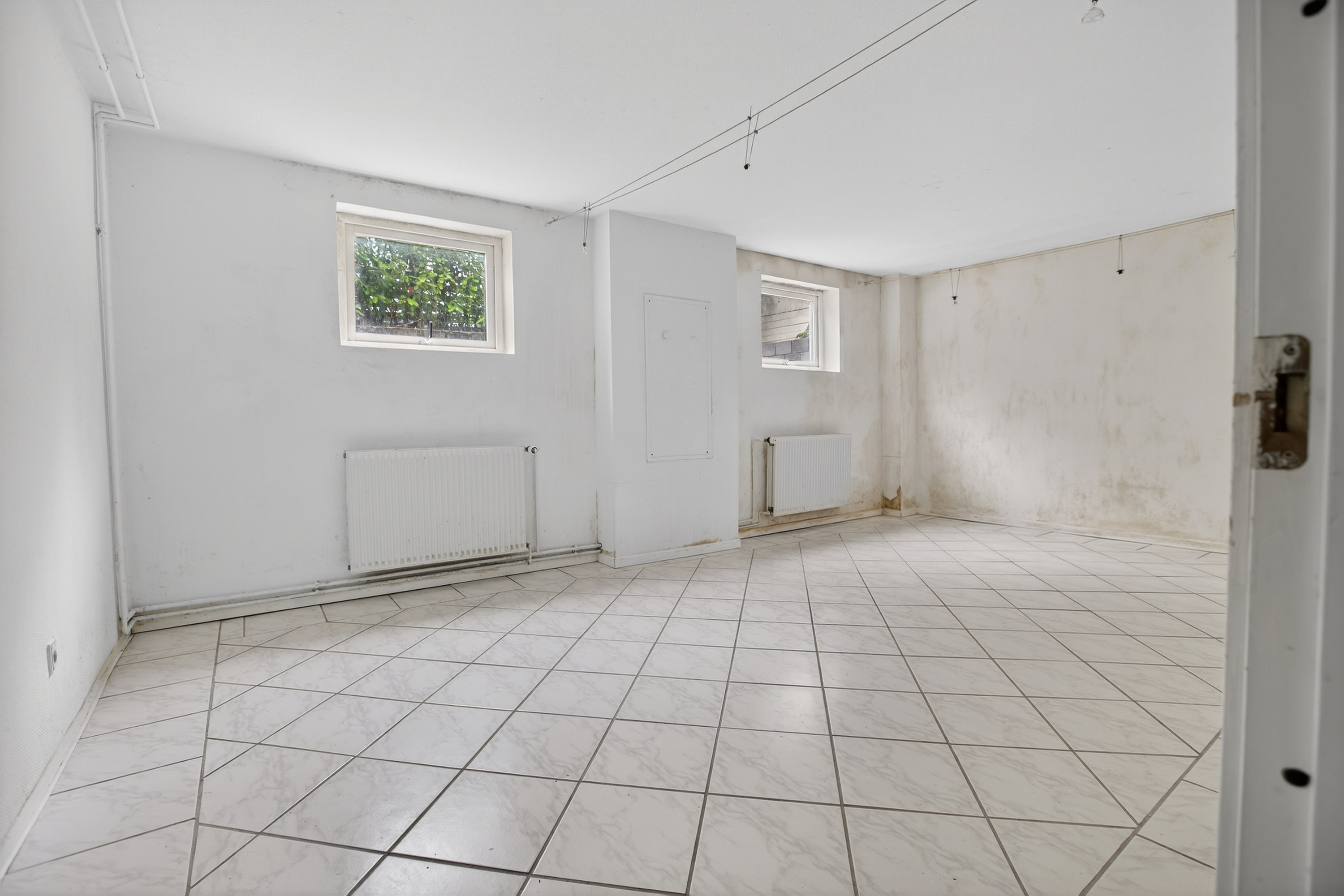 Fremhævet kælder  billede i fuldskærmstilstand. Billede af Vestermarken 2B, 2750 Ballerup