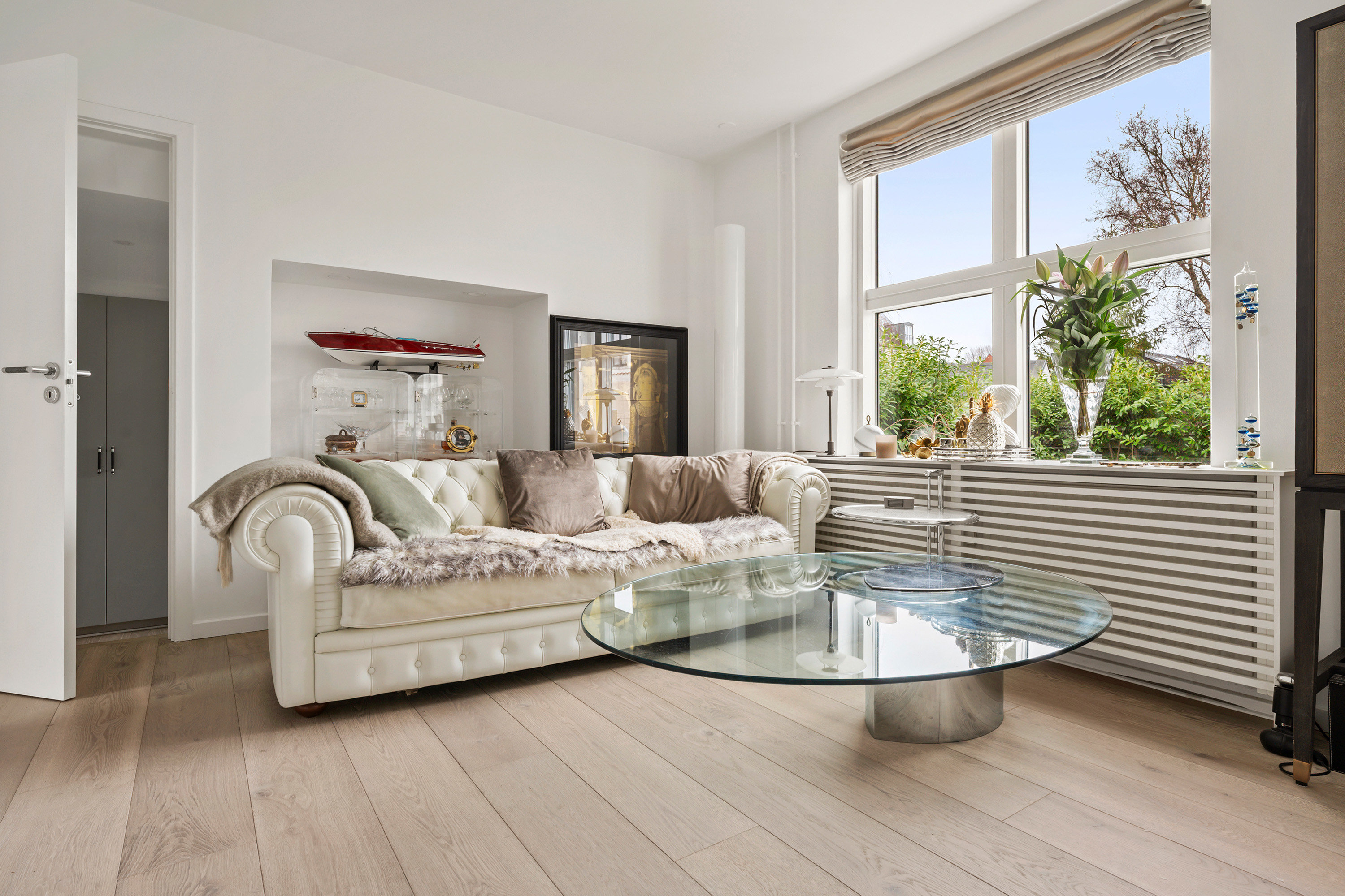 Fremhævet stue billede i fuldskærmstilstand. Billede af Marievej 16B, st.., 2950 Vedbæk