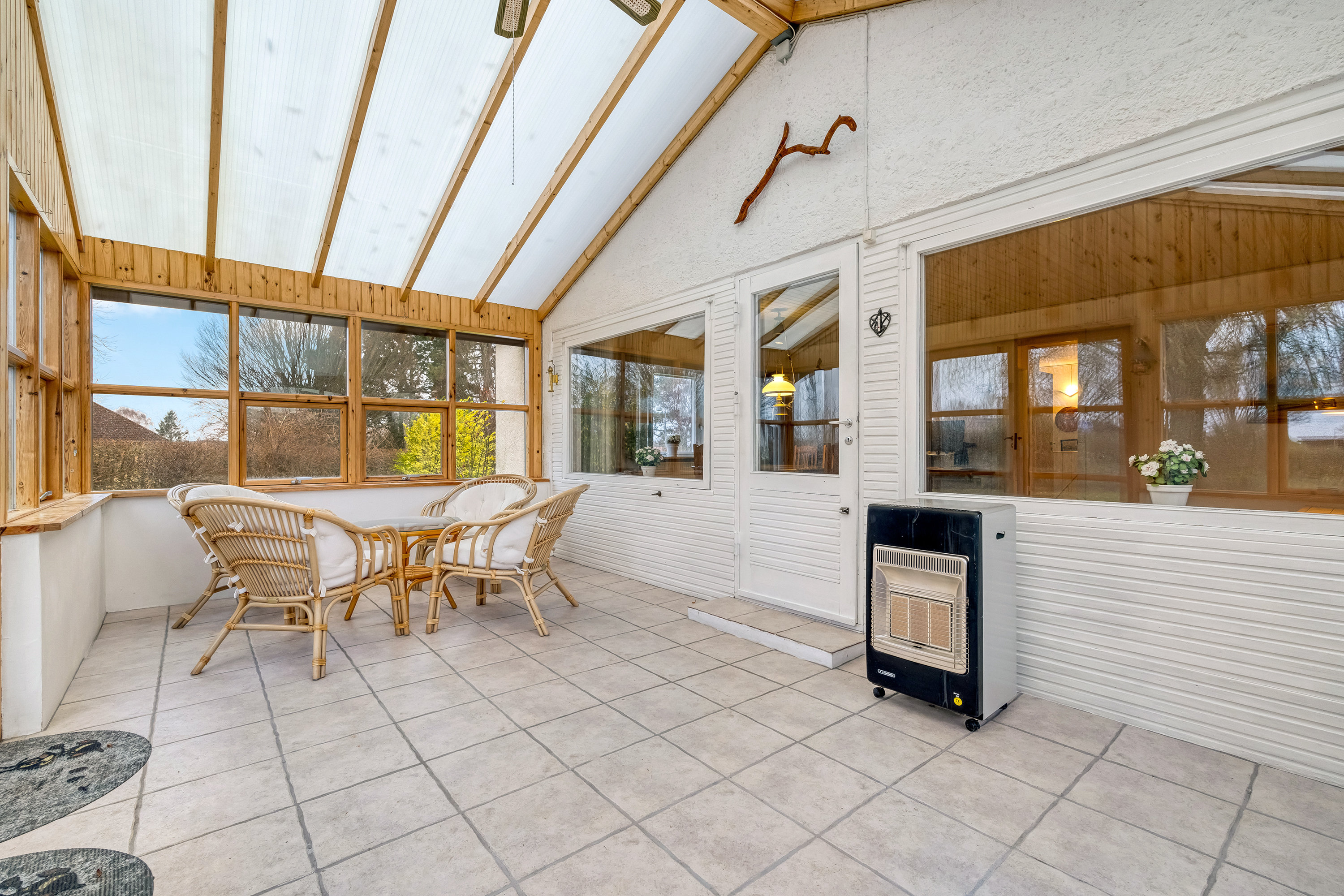 Fremhævet udestue billede i fuldskærmstilstand. Billede af Rostgårdsvej 15, 3250 Gilleleje