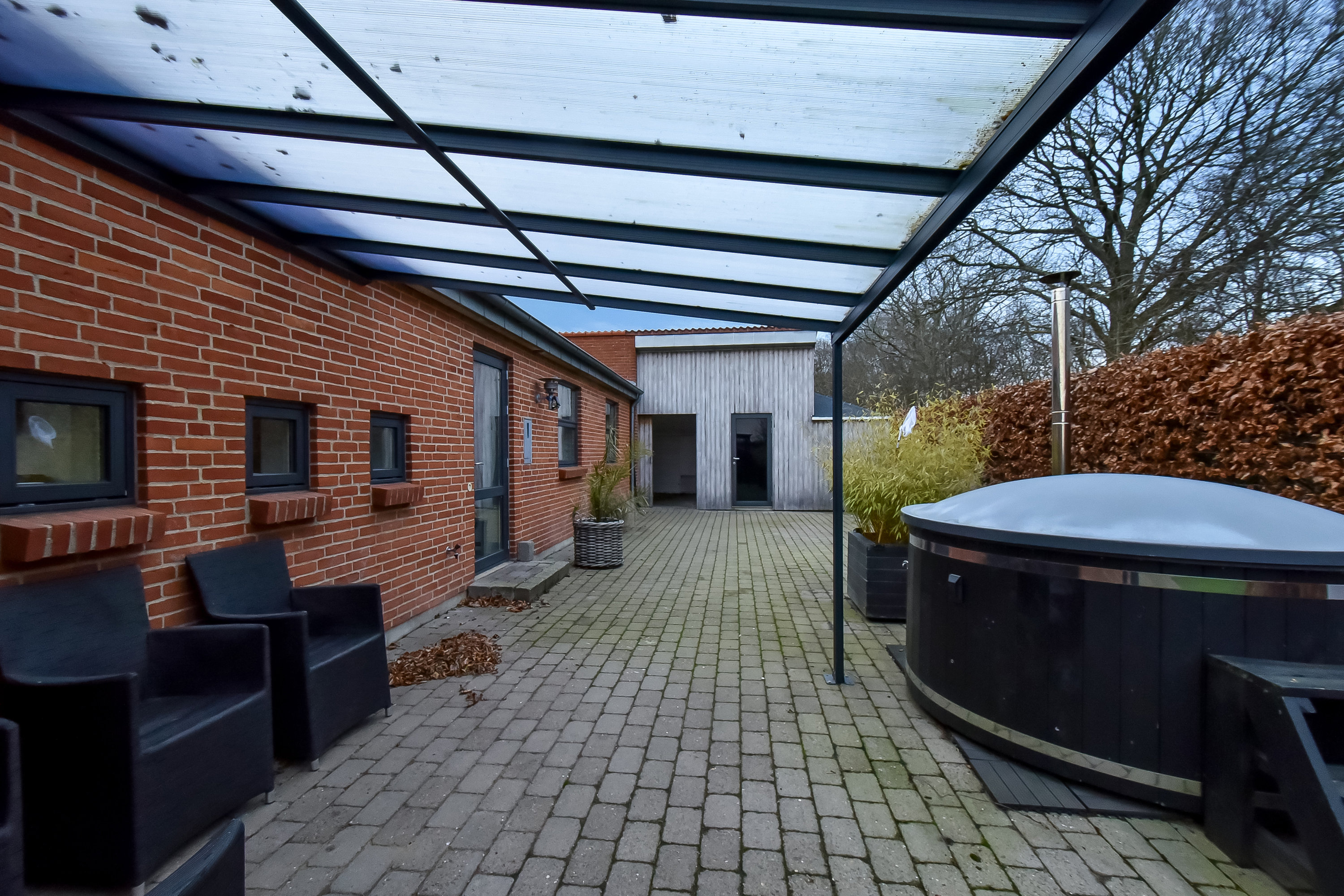 Fremhævet overdækket terrasse billede i fuldskærmstilstand. Billede af Østertorp 16, Gjellerup, 7400 Herning